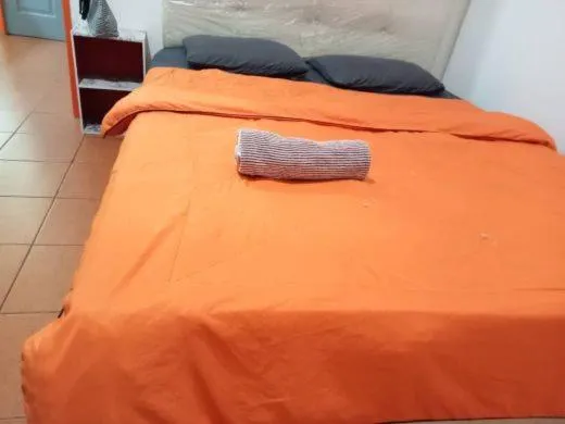 Bedroom in OYO HOME 90768 Flo Inn Motel