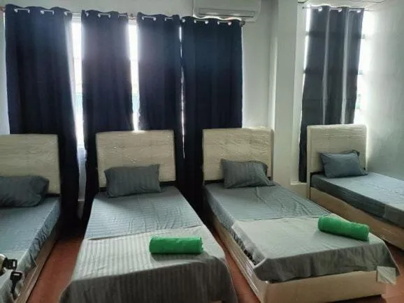 Bedroom in OYO HOME 90768 Flo Inn Motel