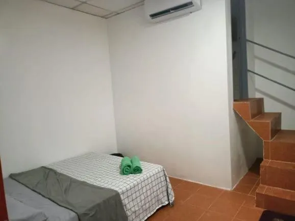 Bedroom in OYO HOME 90768 Flo Inn Motel