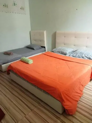 Bedroom in OYO HOME 90768 Flo Inn Motel