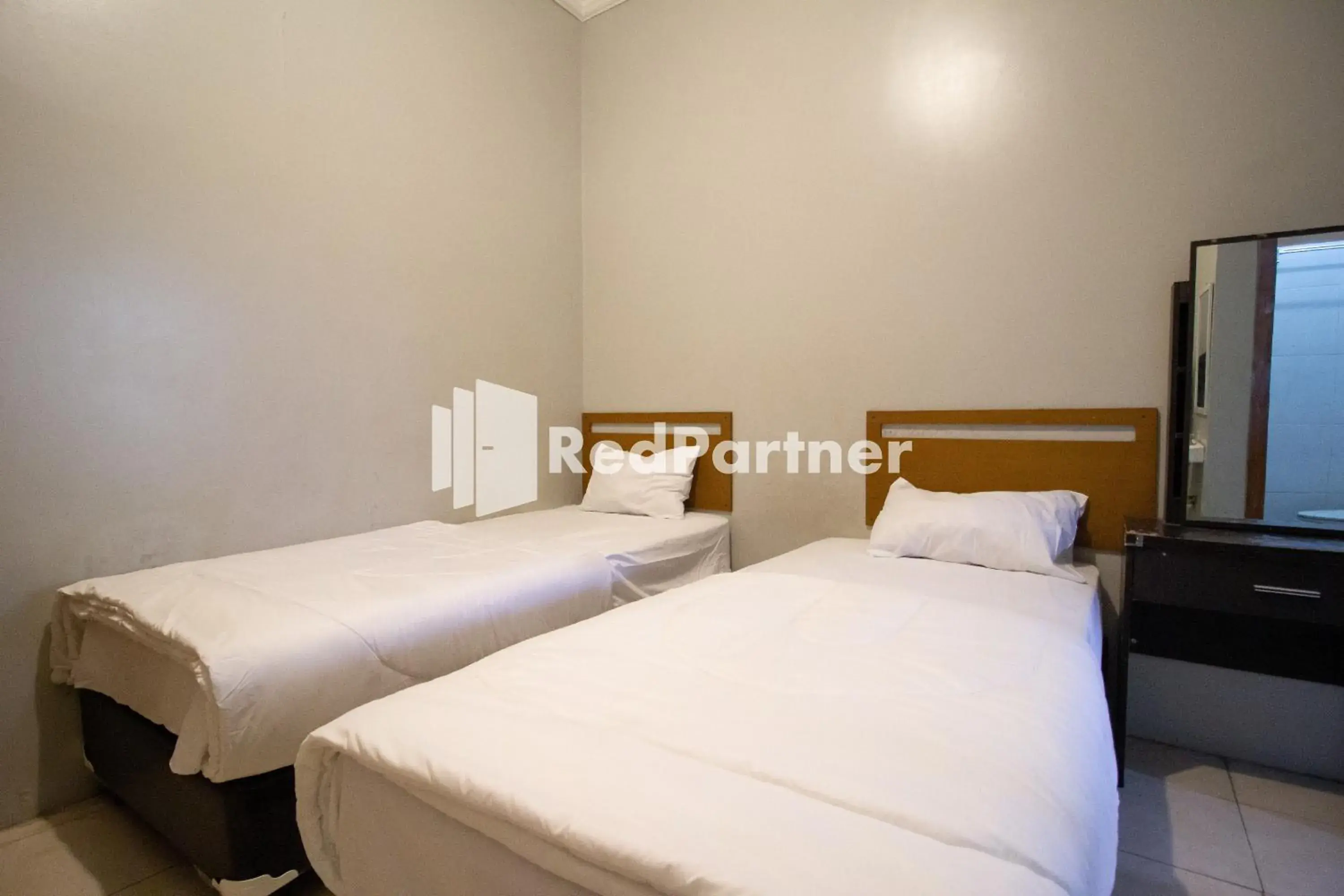 Bedroom, Bed in De Kost Solo Mitra RedDoorz Bedroom, Bed in De Kost Solo Mitra RedDoorz