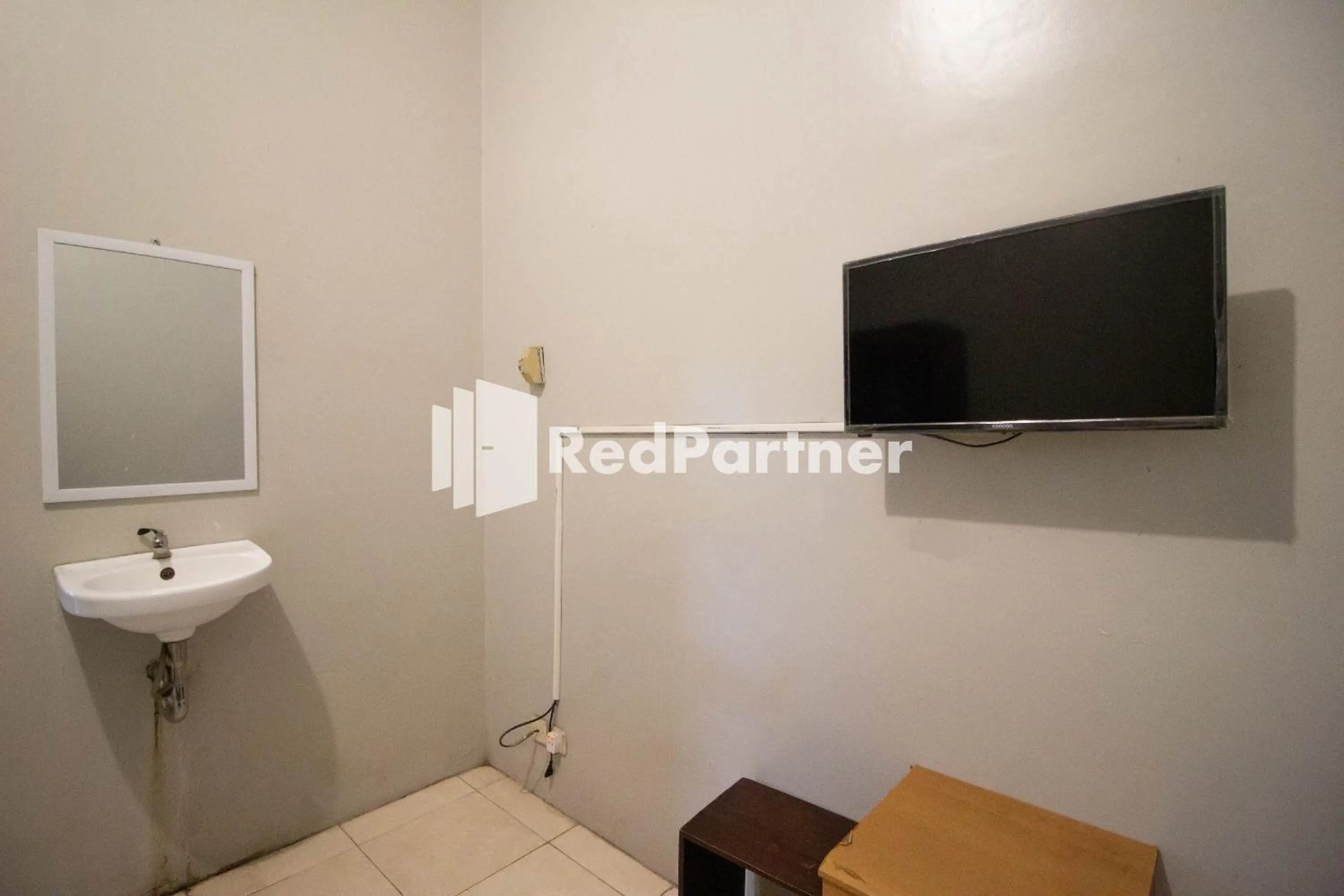 Bathroom in De Kost Solo Mitra RedDoorz