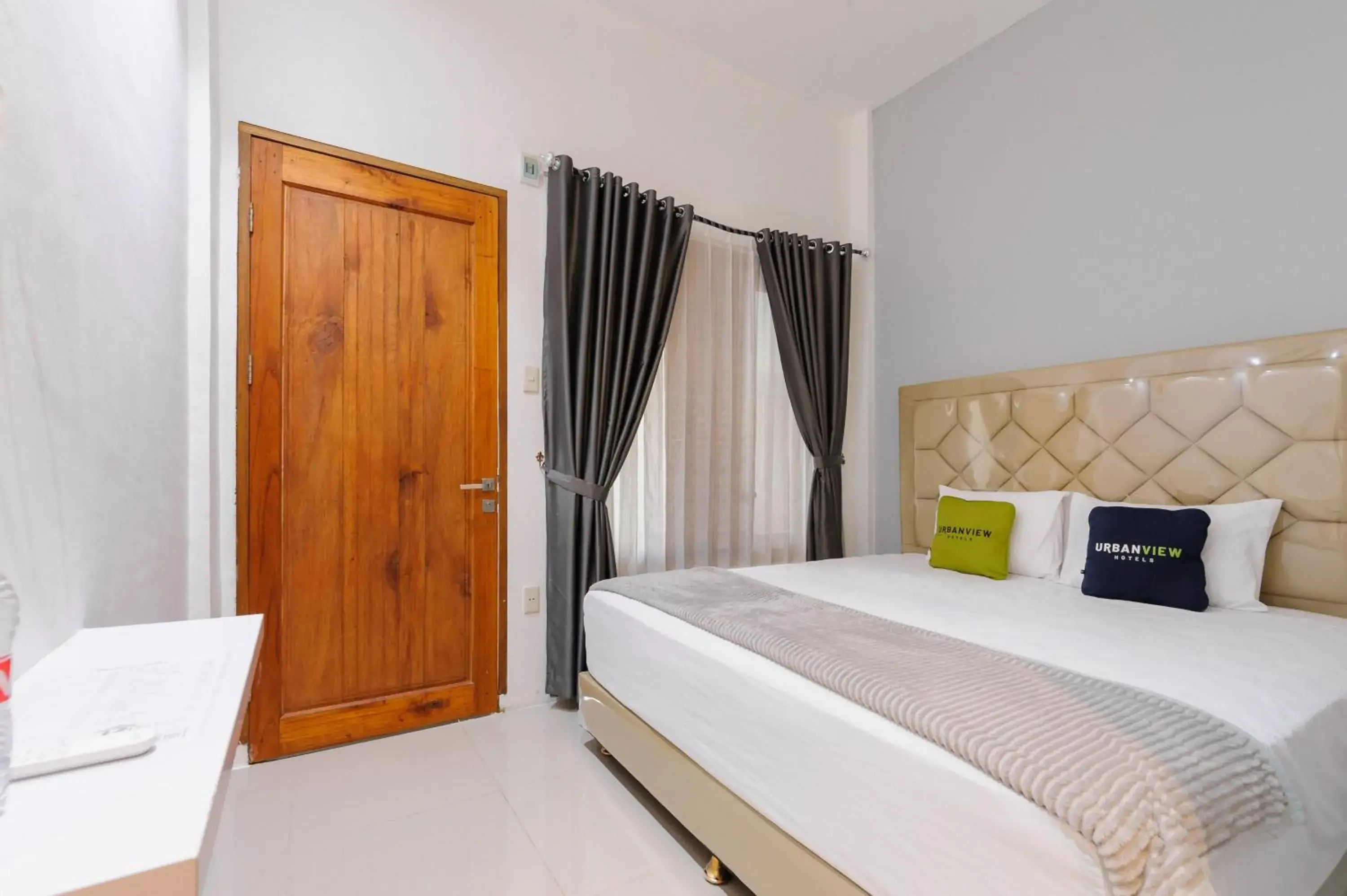 Bedroom, Bed in Urbanview Hotel Brodam's Pematang Siantar by RedDoorz Bedroom, Bed in Urbanview Hotel Brodam's Pematang Siantar by RedDoorz