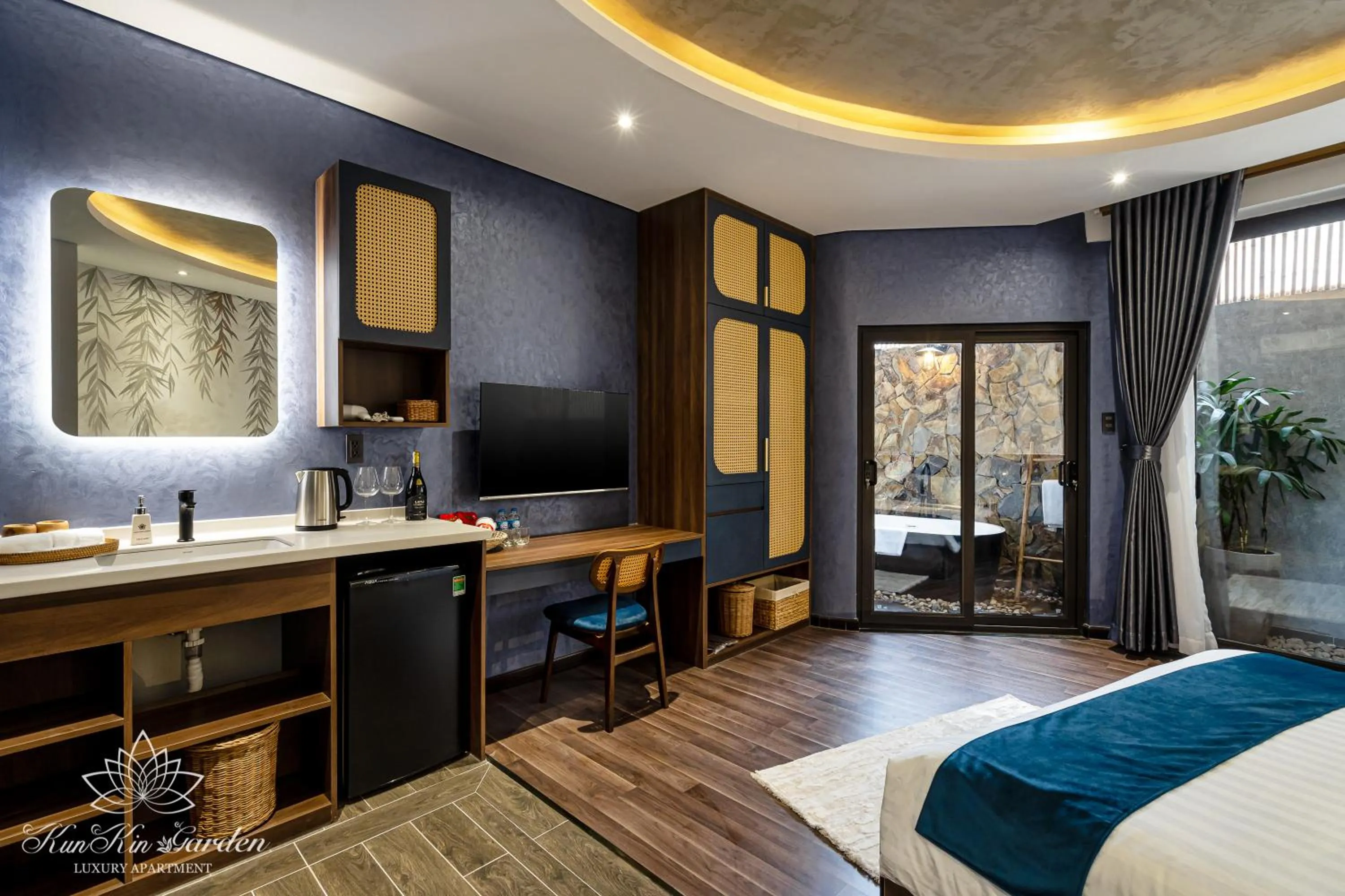 Seating area, Bed in KunKin Garden Aparthotel