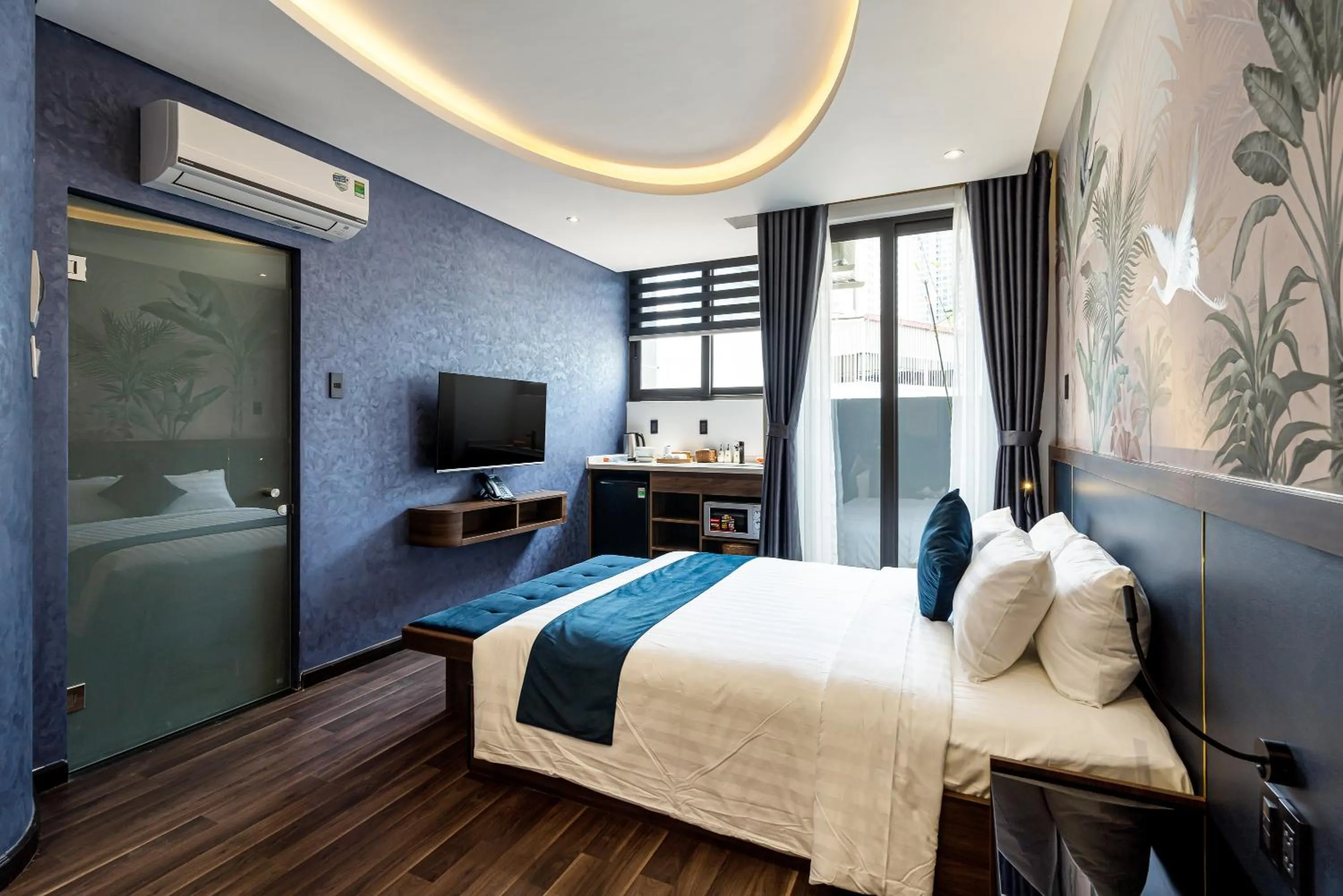 Bed in KunKin Garden Aparthotel