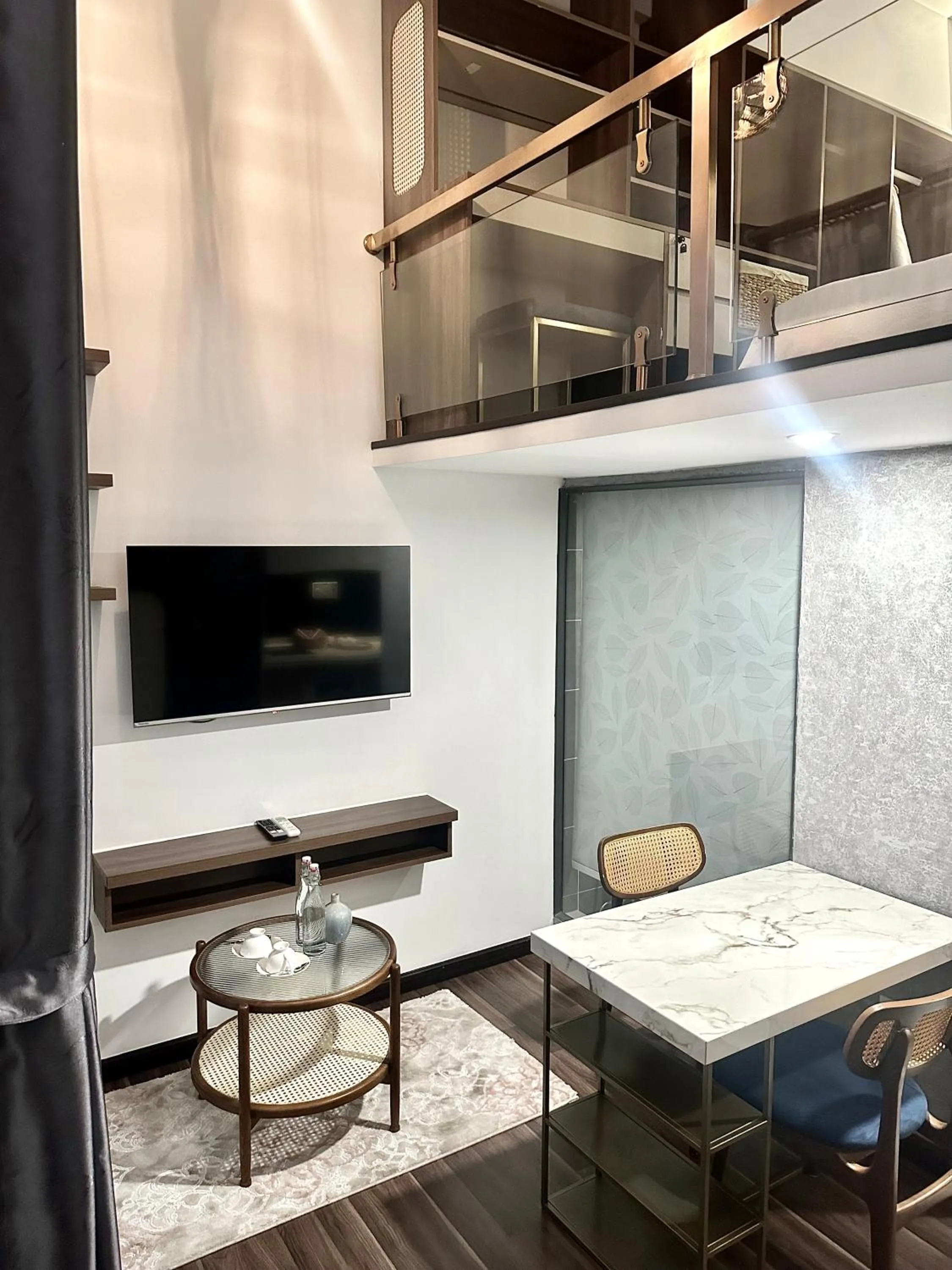 TV and multimedia in KunKin Garden Aparthotel