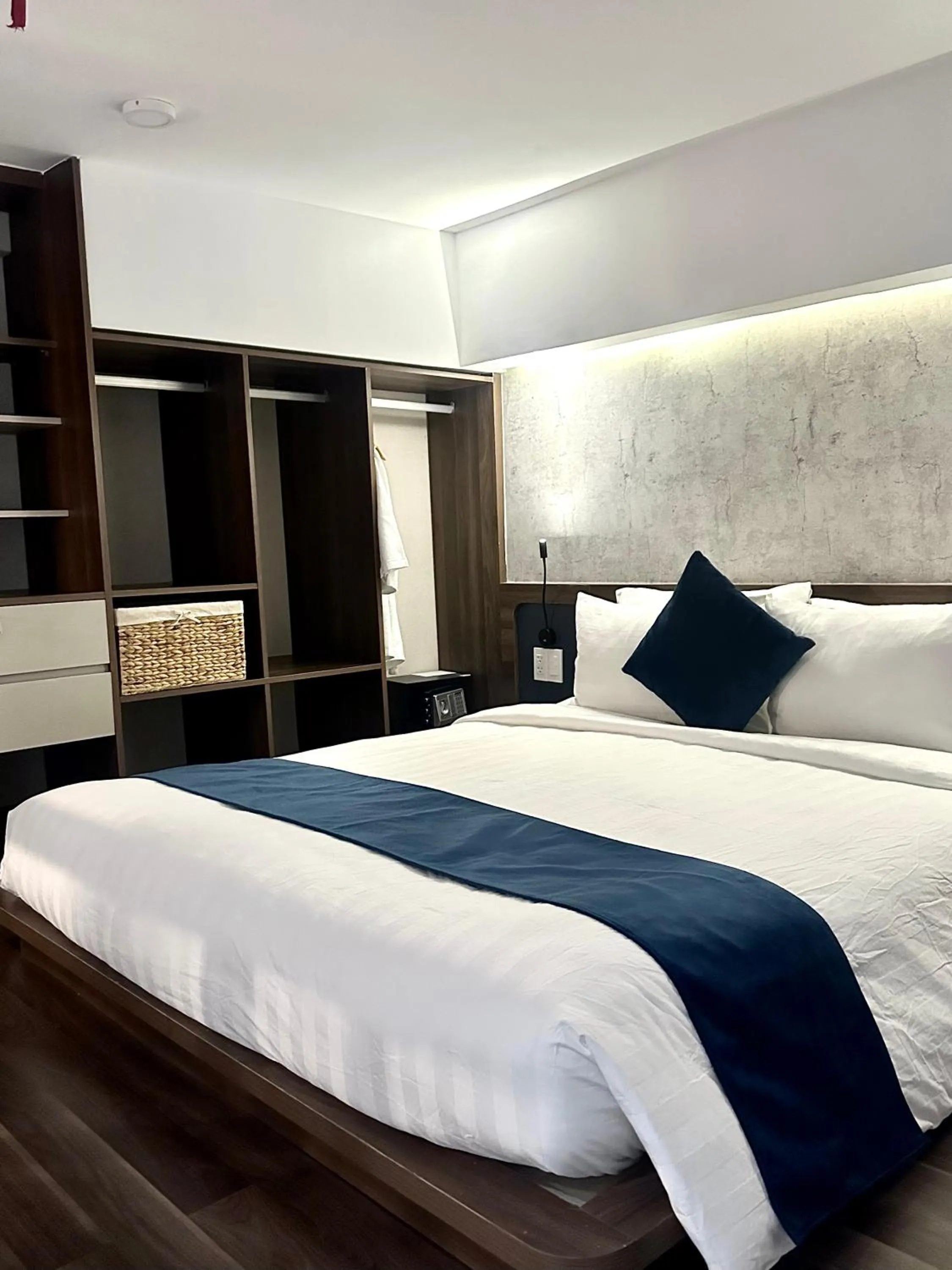 Bed in KunKin Garden Aparthotel