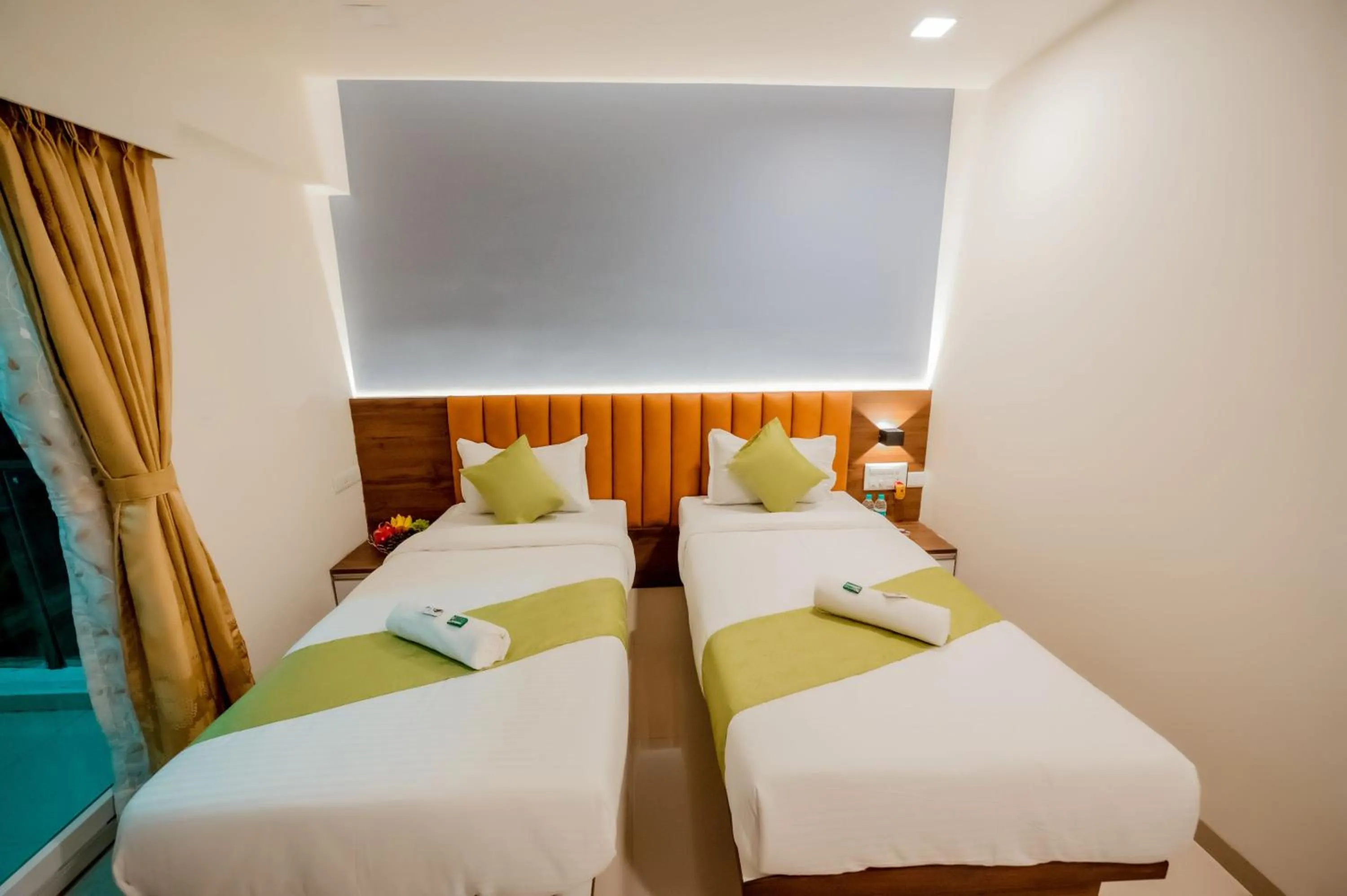 Bed in Hotel Heraa International