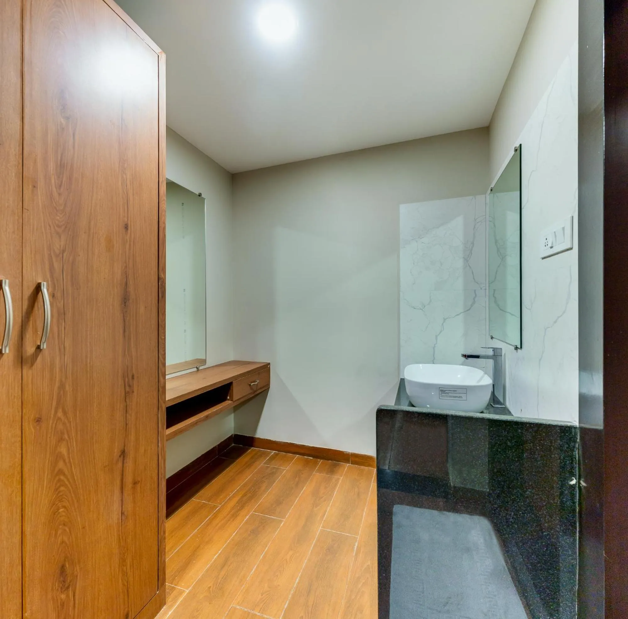 Bathroom in VOV Hotels Vijayapura Part Of Shubhashree Group