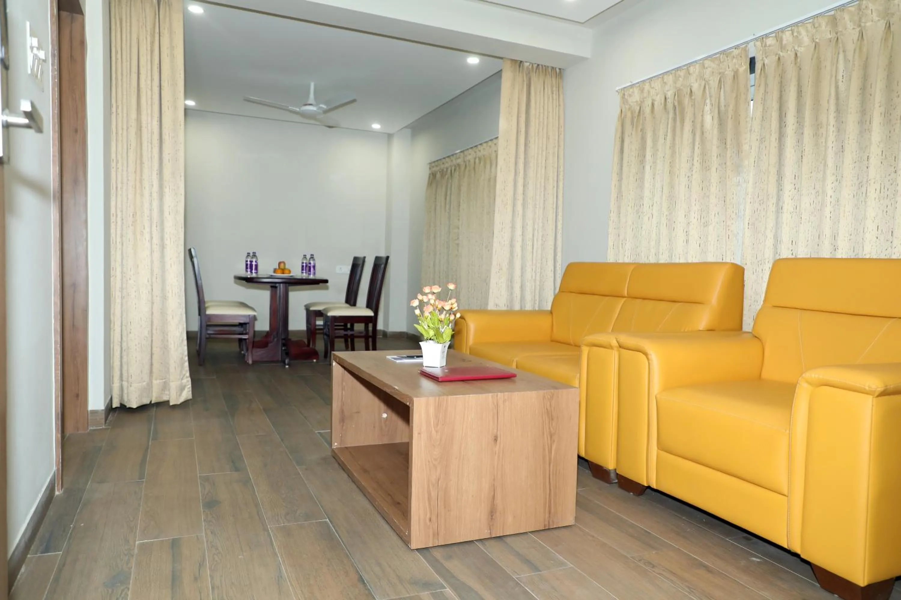 Living room in VOV Hotels Vijayapura Part Of Shubhashree Group