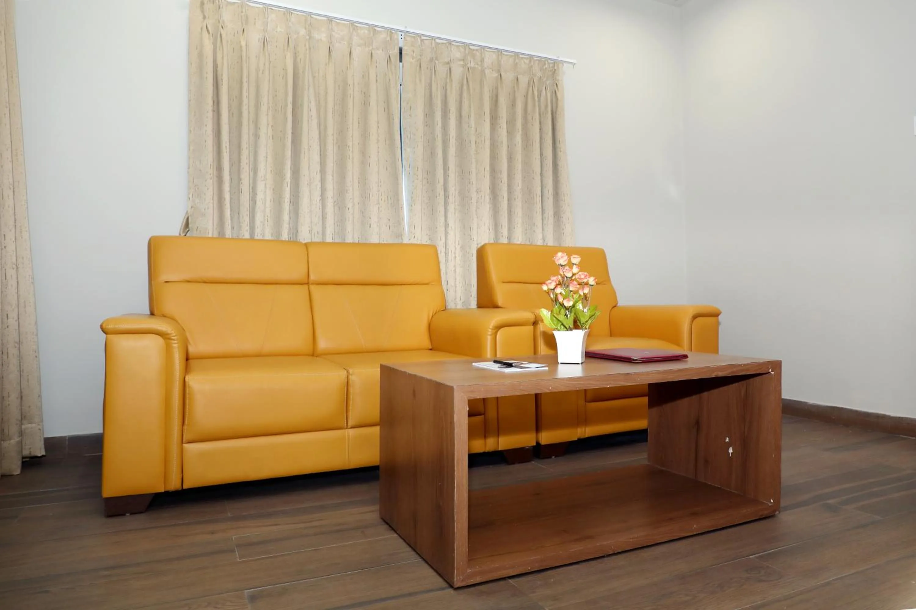 Seating area in VOV Hotels Vijayapura Part Of Shubhashree Group