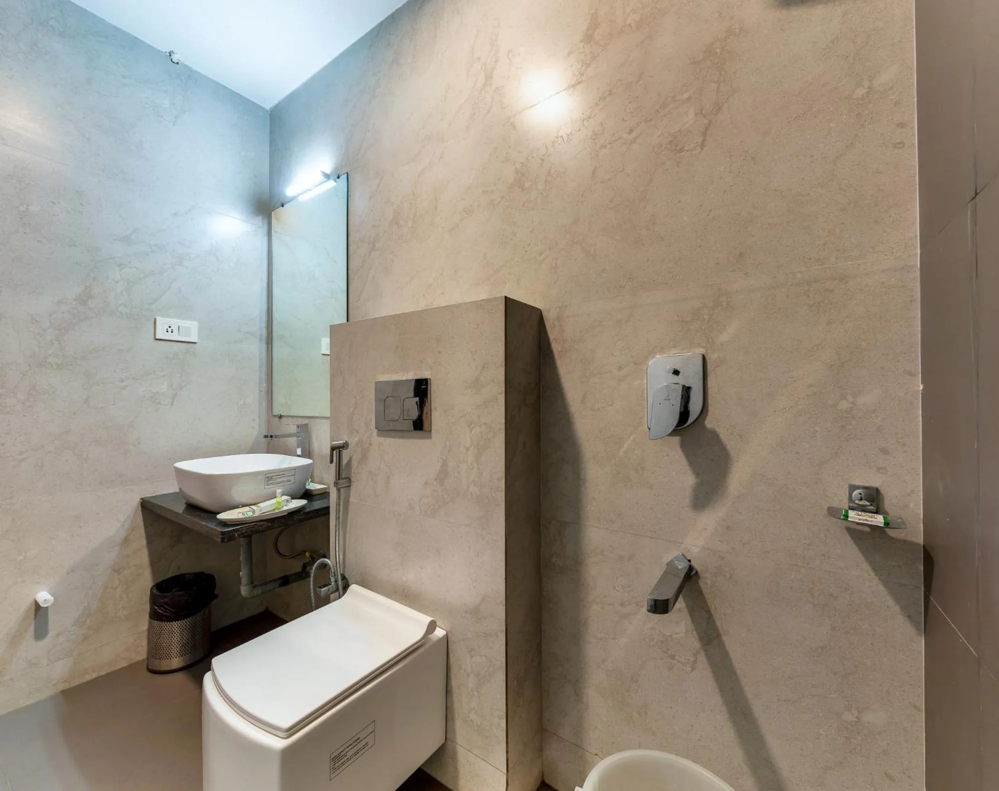 Bathroom in VOV Hotels Vijayapura Part Of Shubhashree Group