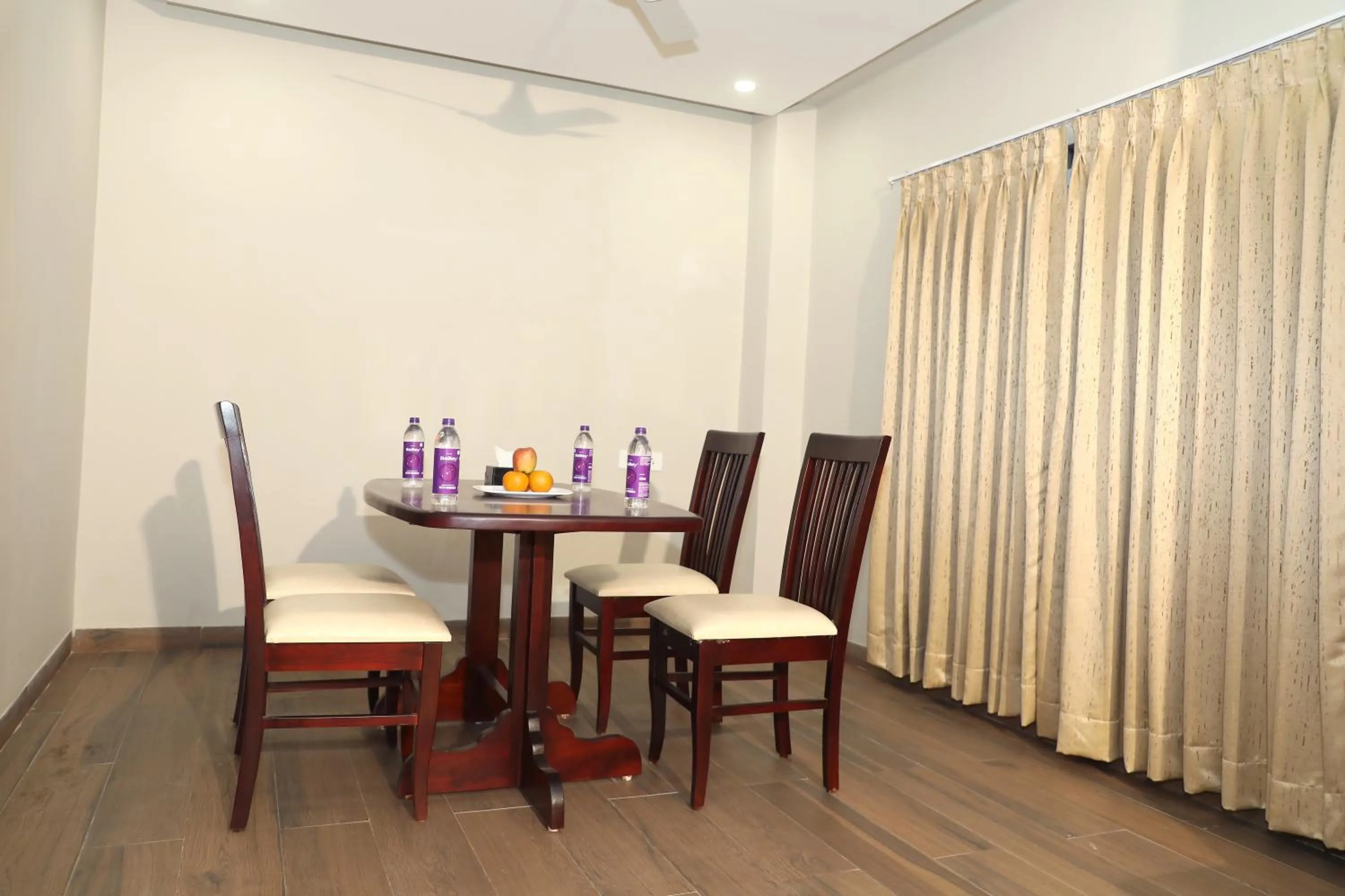 Dining area in VOV Hotels Vijayapura Part Of Shubhashree Group