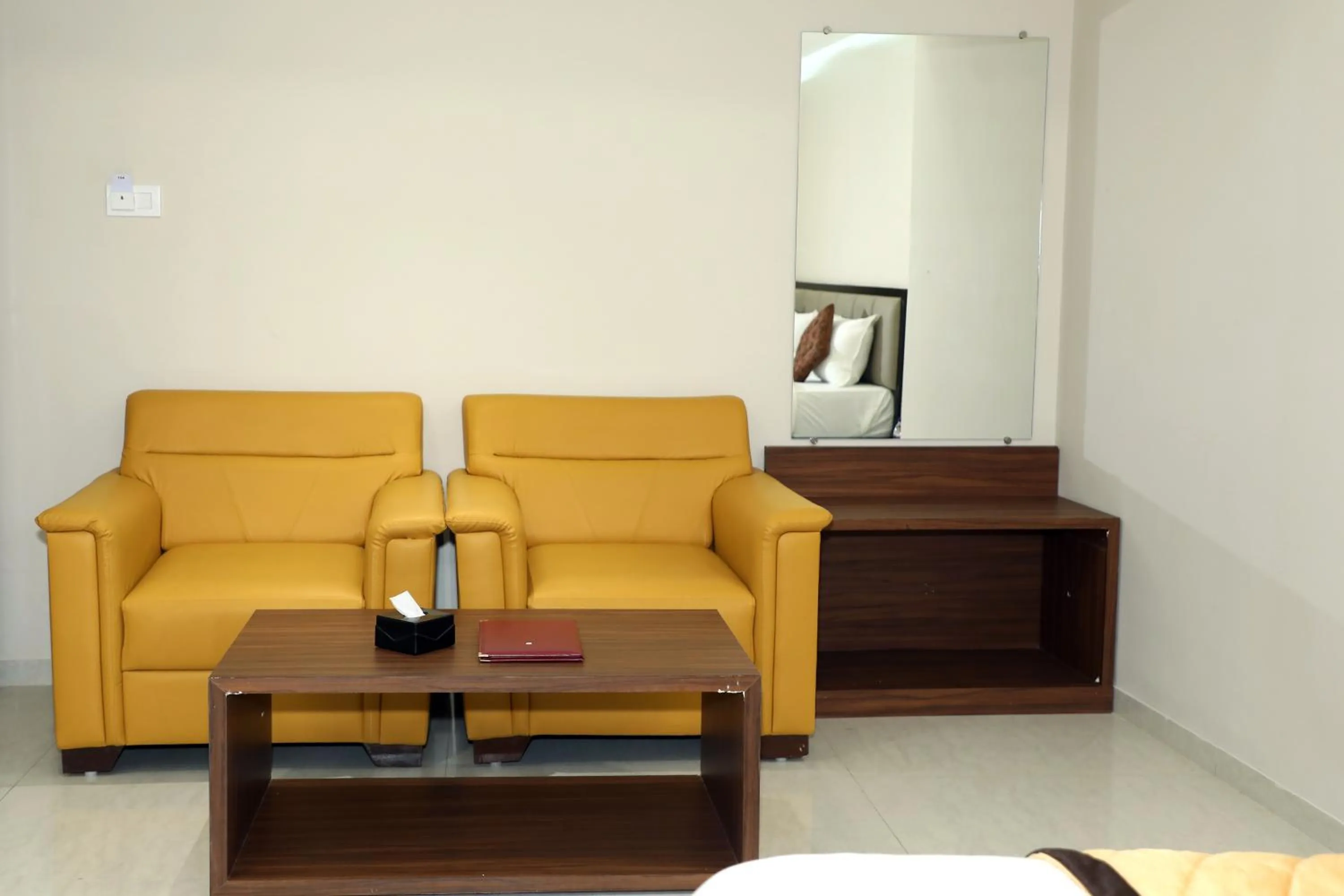 Seating area in VOV Hotels Vijayapura Part Of Shubhashree Group