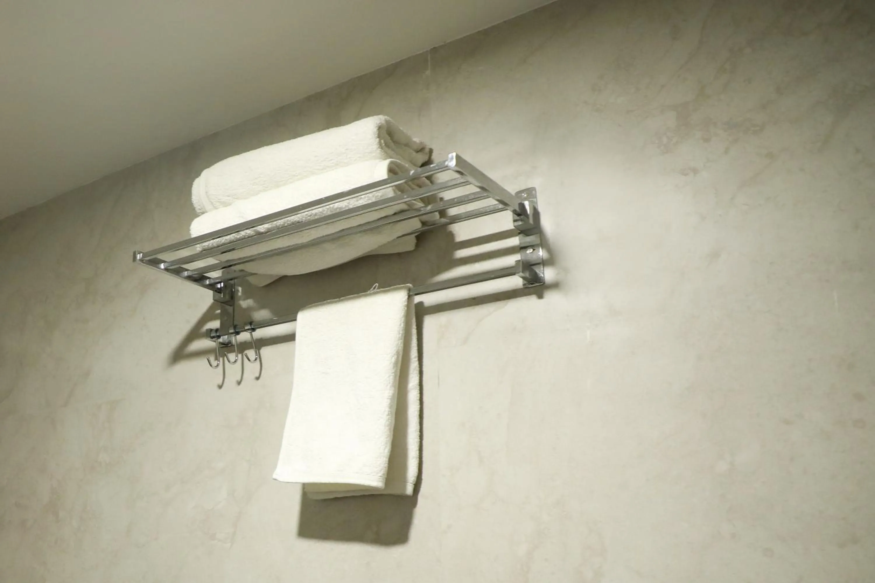 towels in VOV Hotels Vijayapura Part Of Shubhashree Group