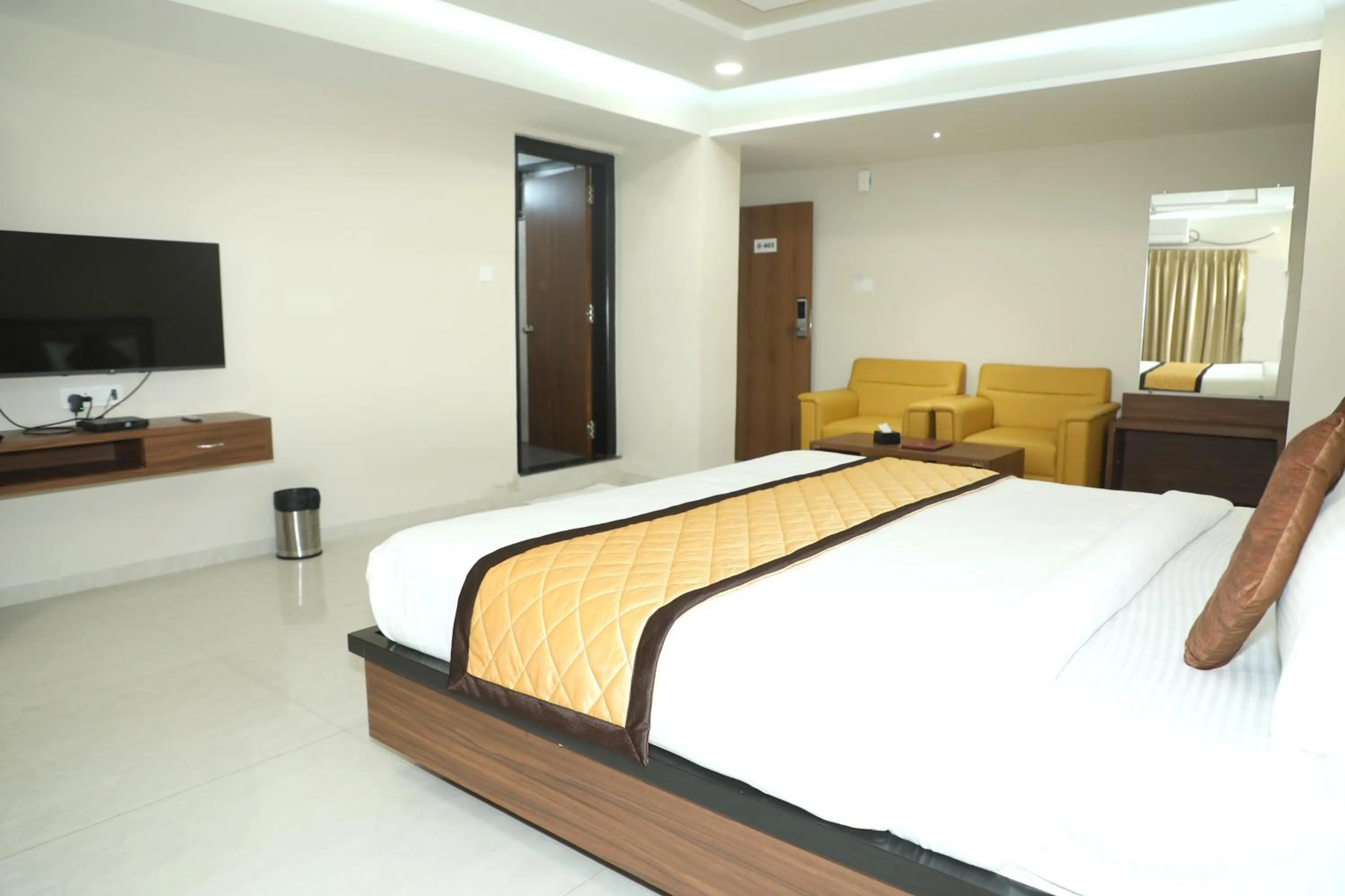Photo of the whole room, Bed in VOV Hotels Vijayapura Part Of Shubhashree Group