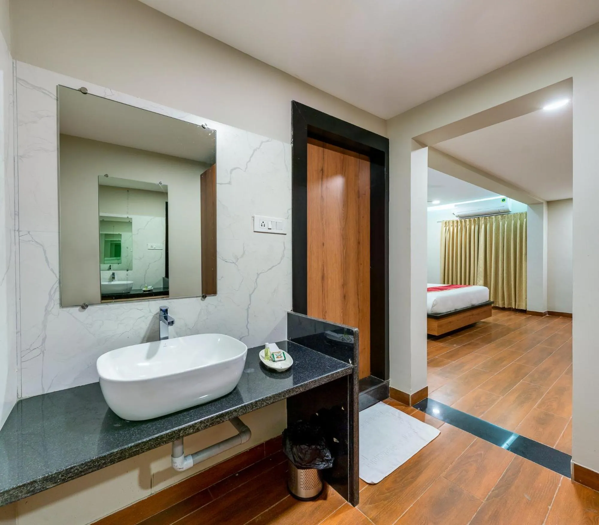 Bathroom, Bed in VOV Hotels Vijayapura Part Of Shubhashree Group