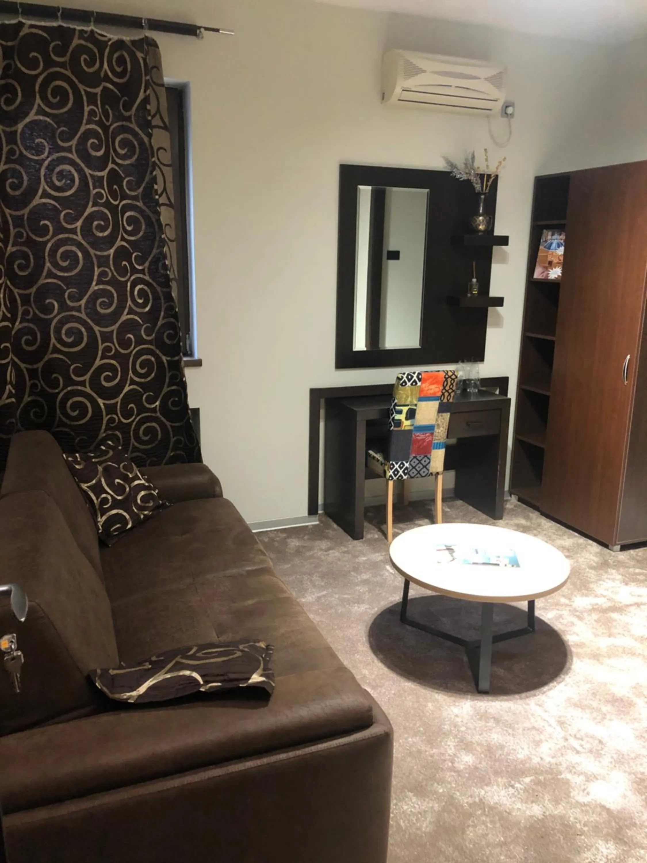 Living room in City Code In Joy