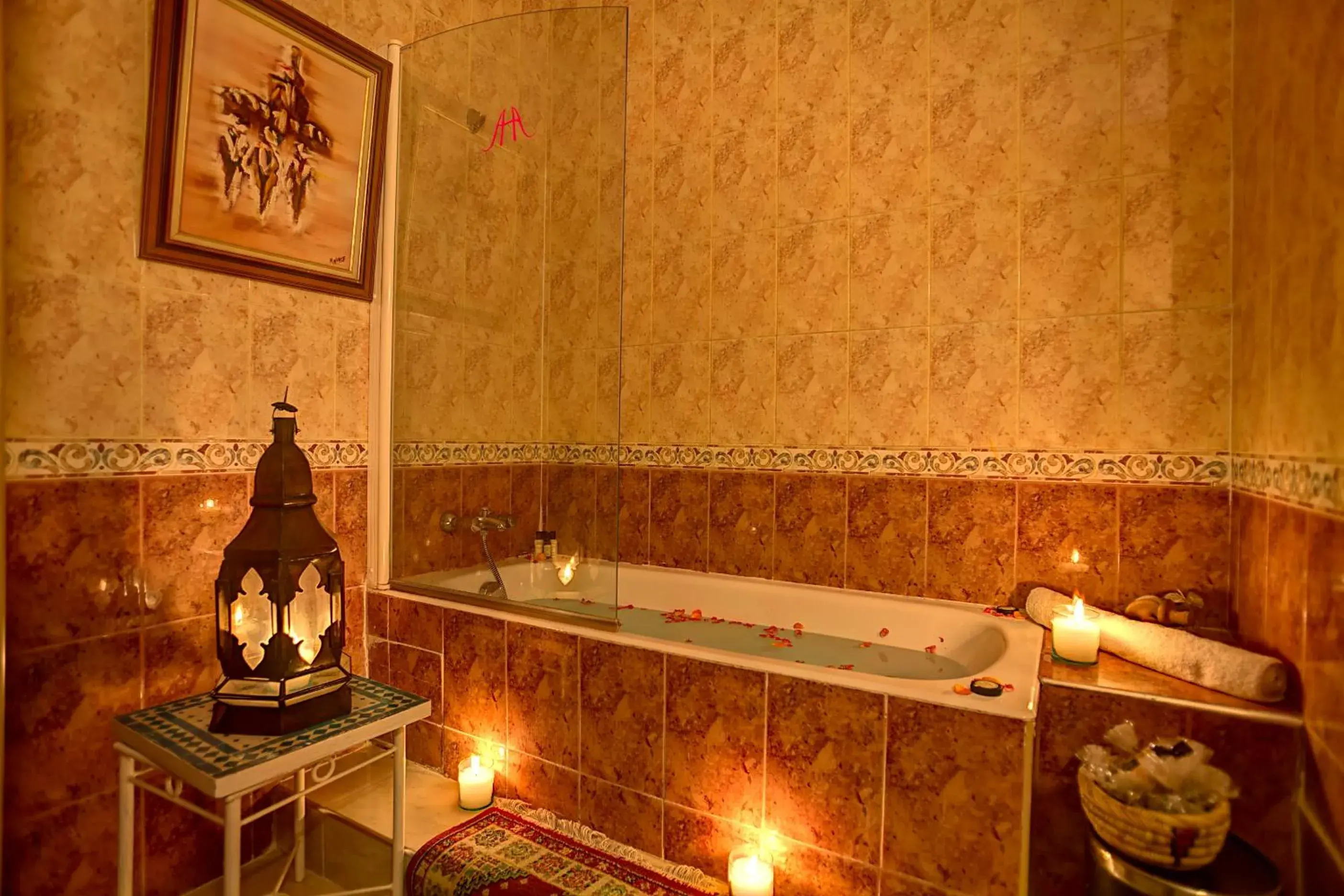 Bathroom in Amani Hotel Suites & Spa Bathroom in Amani Hotel Suites & Spa