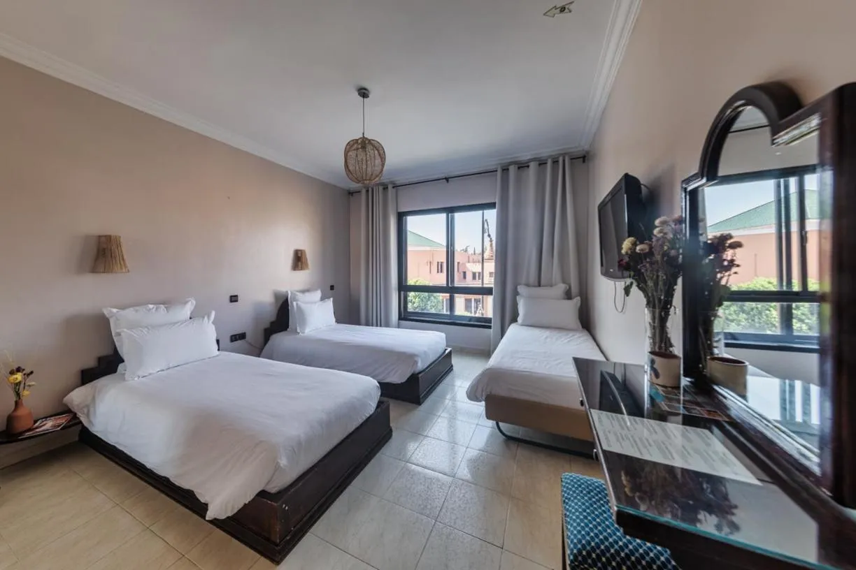 Bed in Amani Hotel Suites & Spa