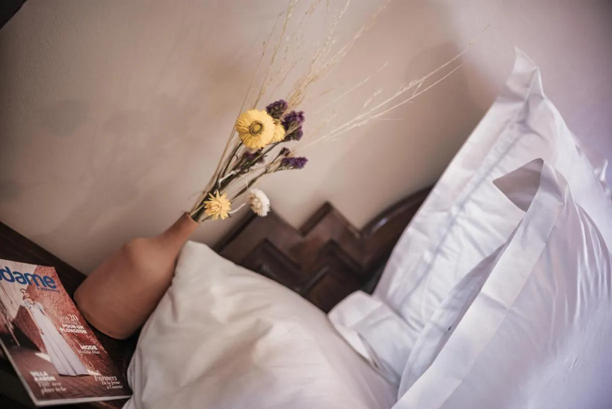 Bed in Amani Hotel Suites & Spa