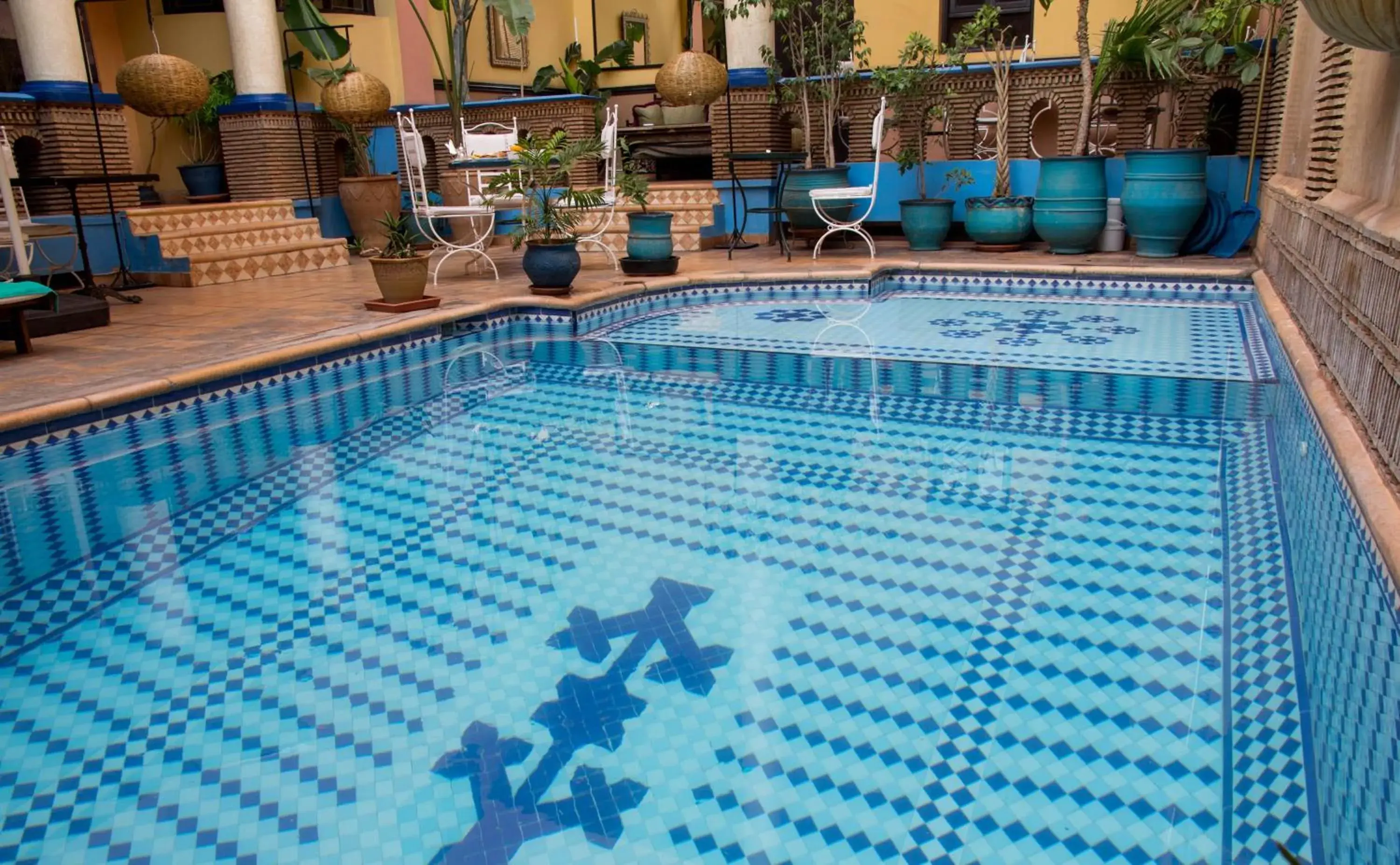 Swimming pool in Amani Hotel Suites & Spa Swimming pool in Amani Hotel Suites & Spa