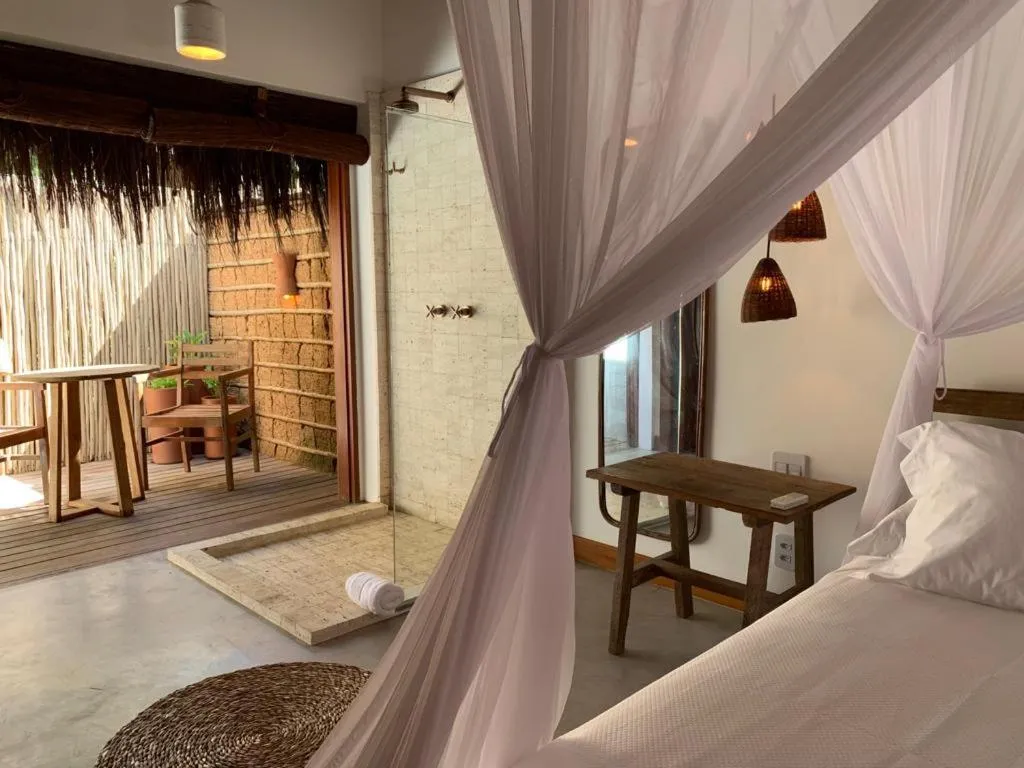 Bed in Pousada Hayo Pé na Areia