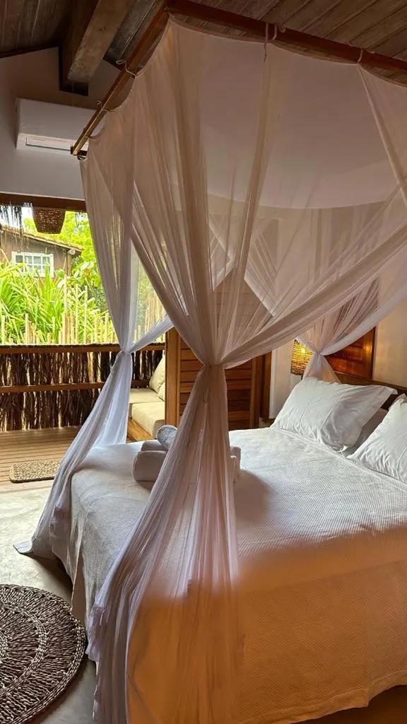 Bed in Pousada Hayo Pé na Areia