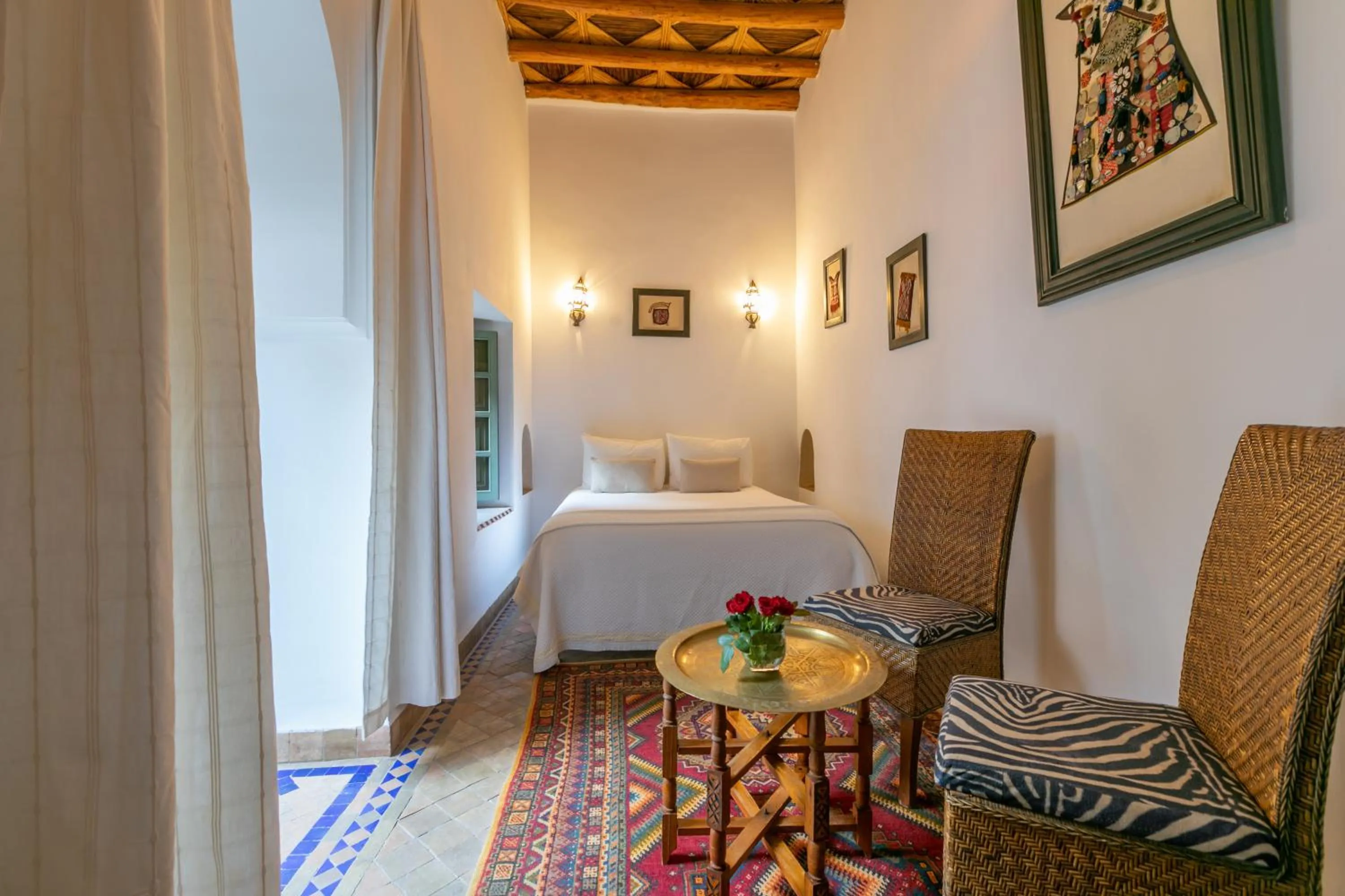 Bed in Riad Les Trois Palmiers El Bacha