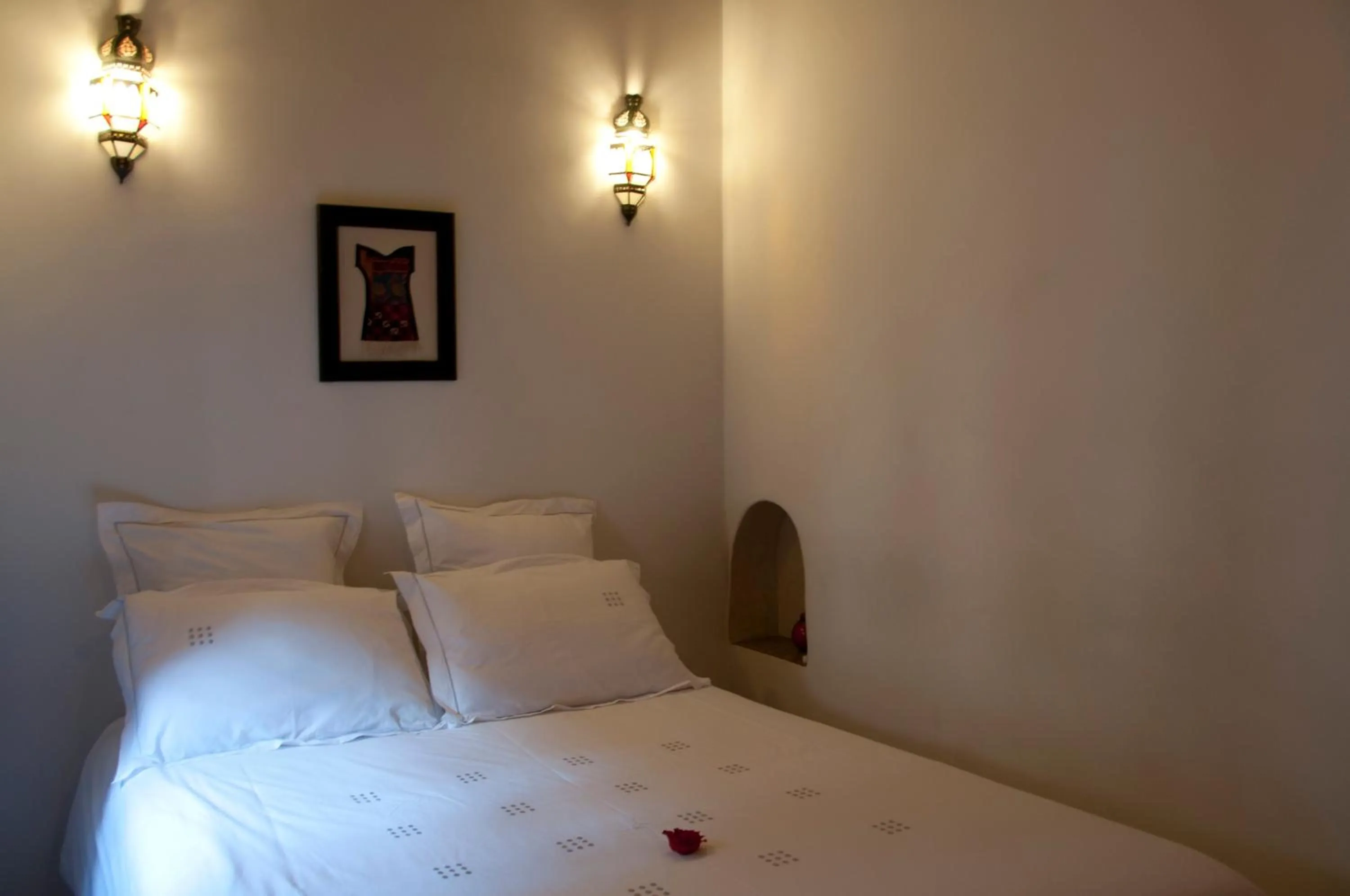 Bed in Riad Les Trois Palmiers El Bacha