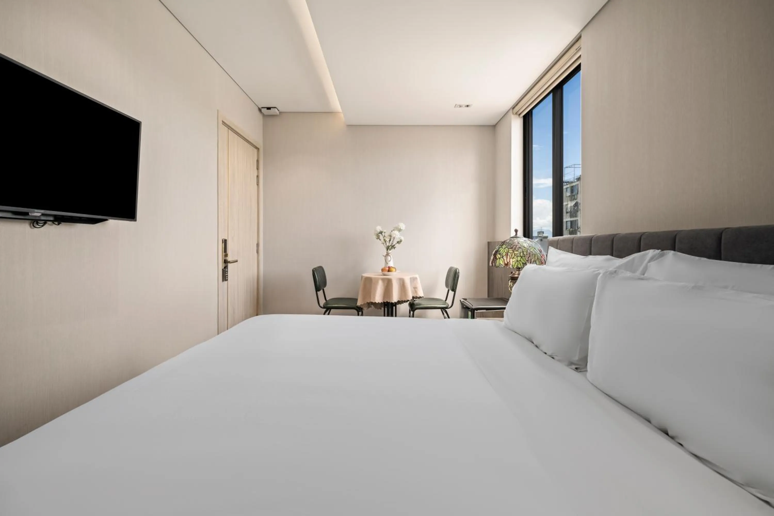 Bed in Tashi Ocean Garden & Apartment Da Nang - My Khe Beach