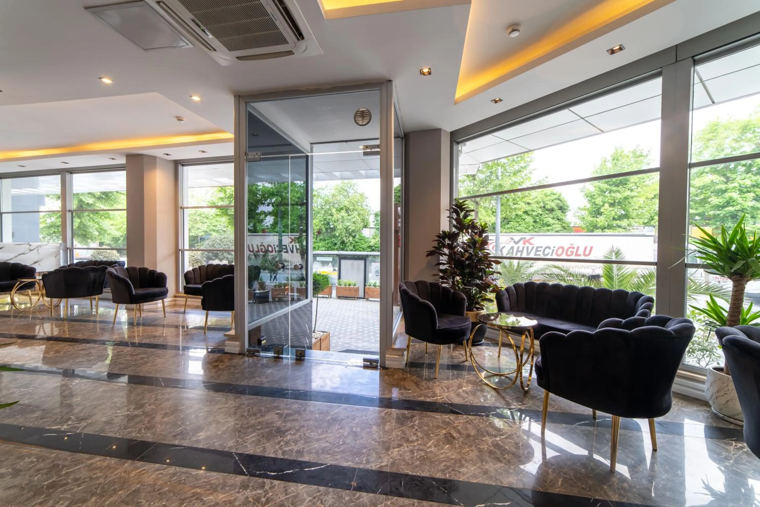 Lobby or reception in Garden Room Suit Hotel