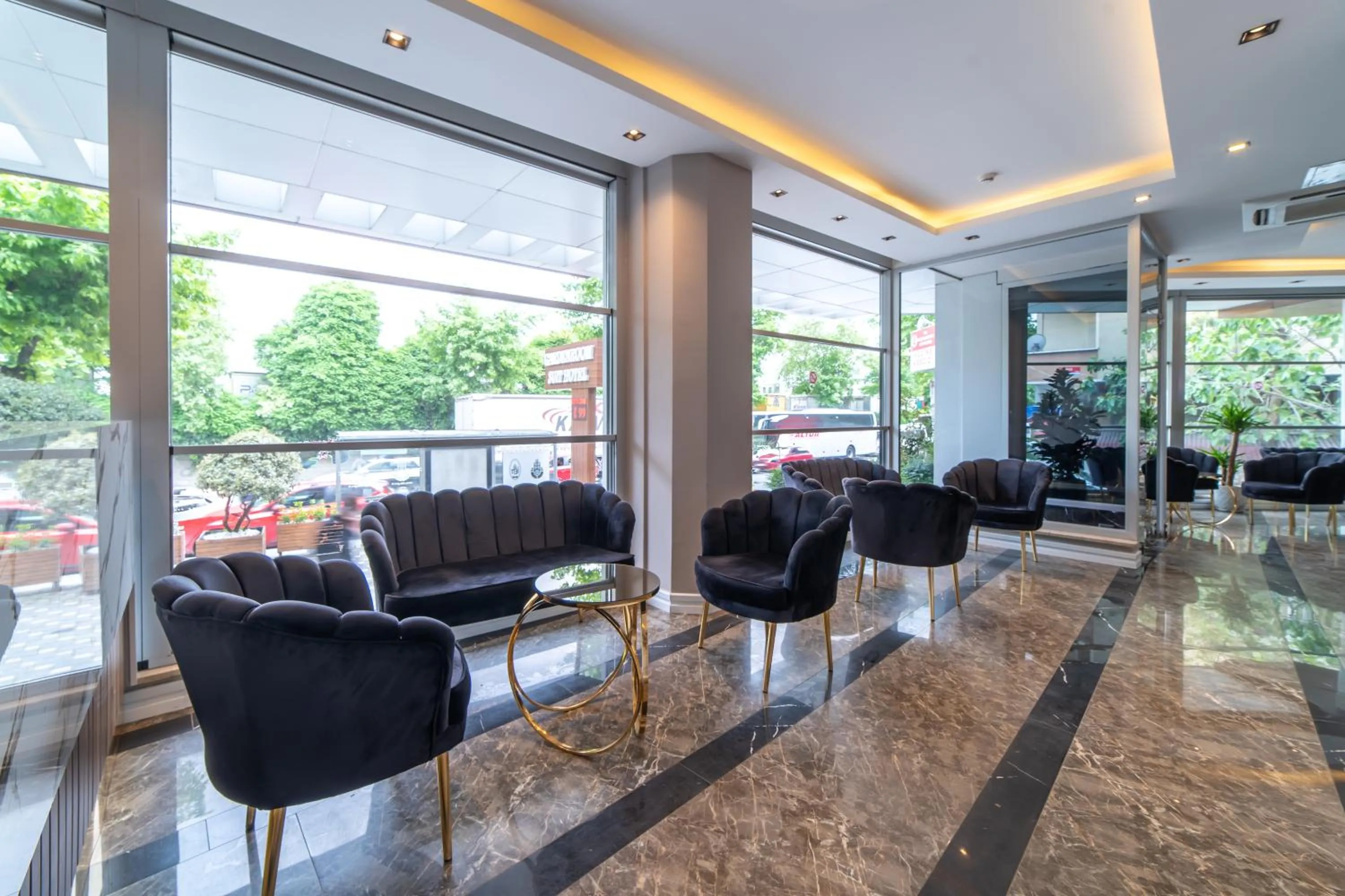 Lobby or reception in Garden Room Suit Hotel