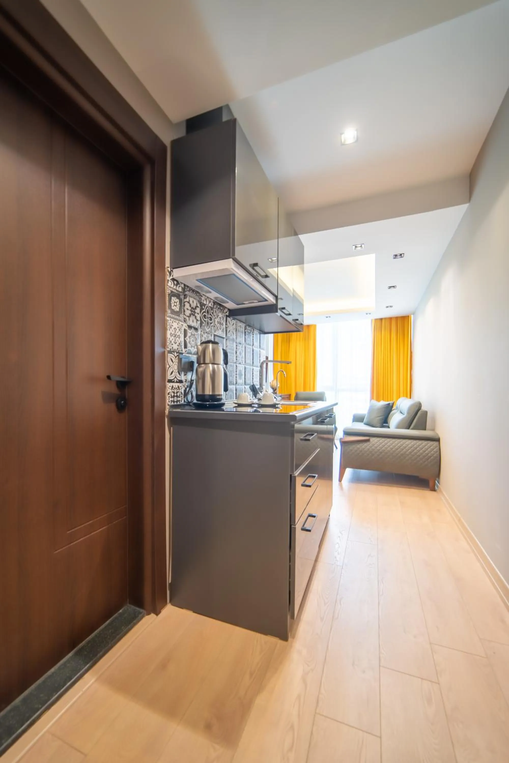 Kitchen or kitchenette in Garden Room Suit Hotel