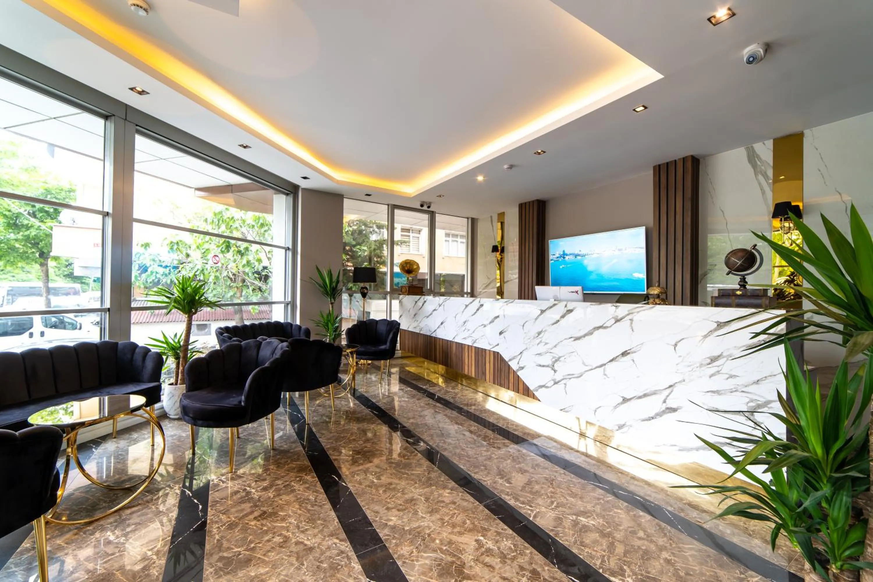 Lobby or reception in Garden Room Suit Hotel