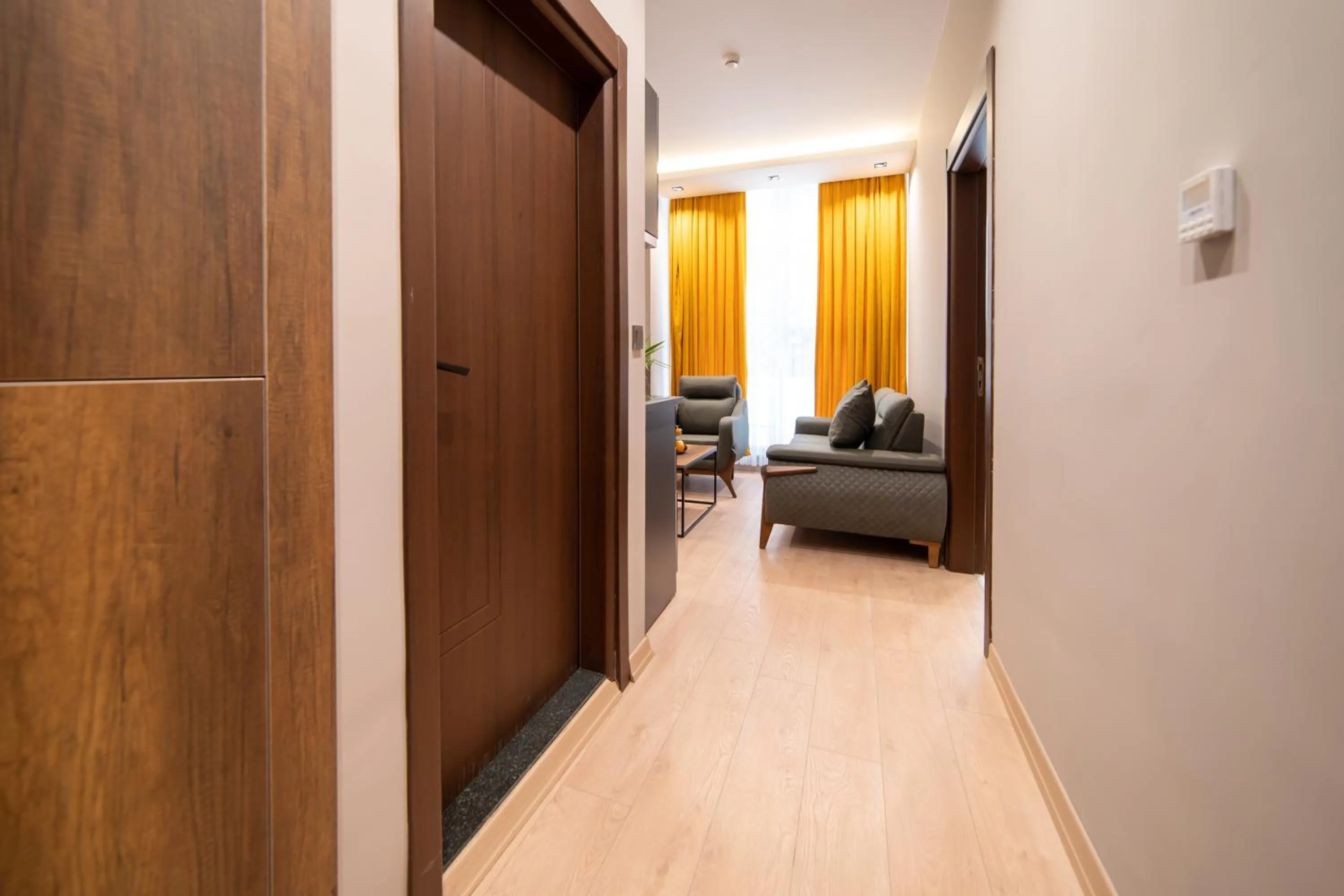 Living room in Garden Room Suit Hotel