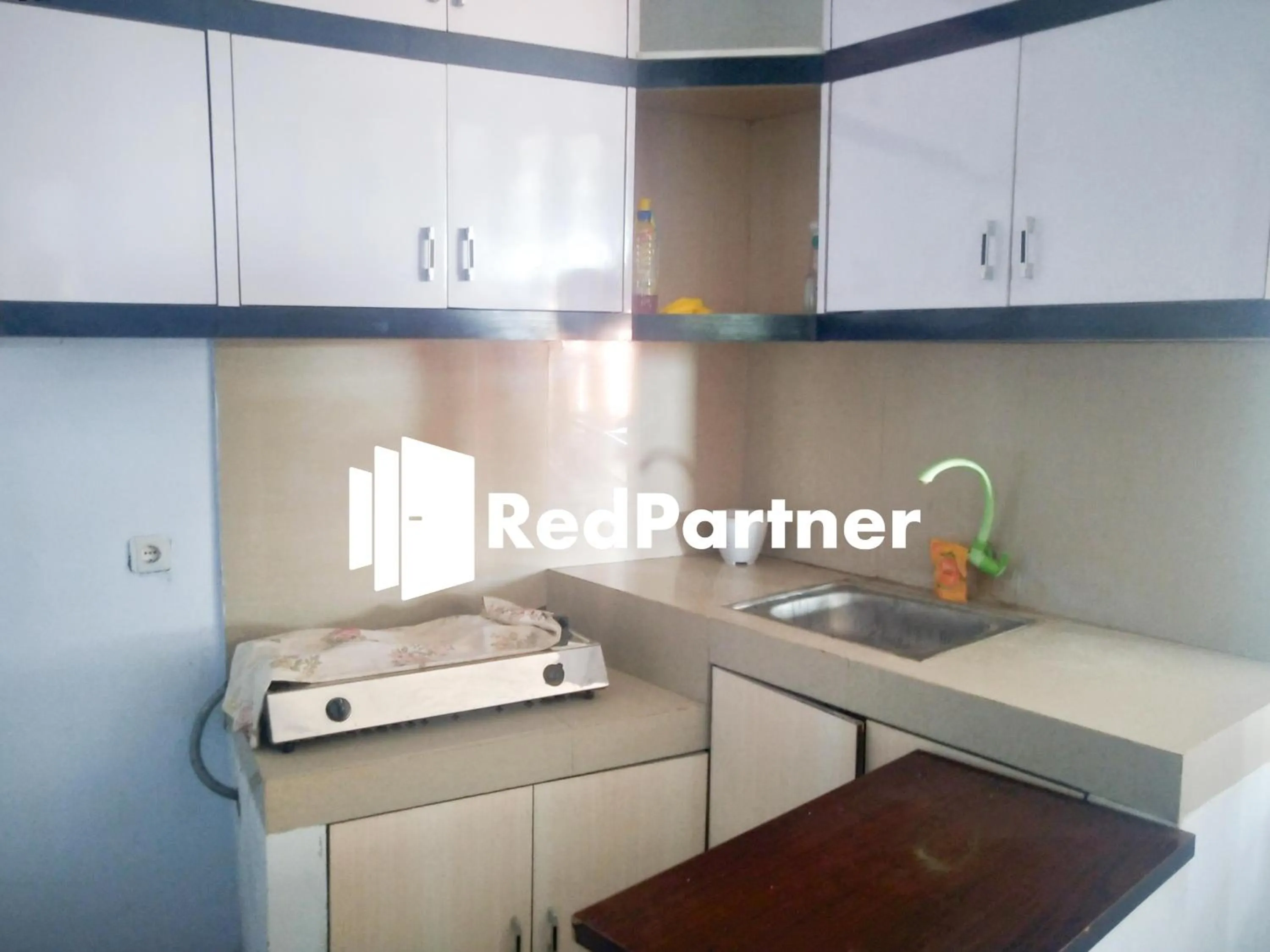 Kitchen or kitchenette in Riyani Residence At Jalan Ahmad Yani Pemalang Mitra RedDoorz