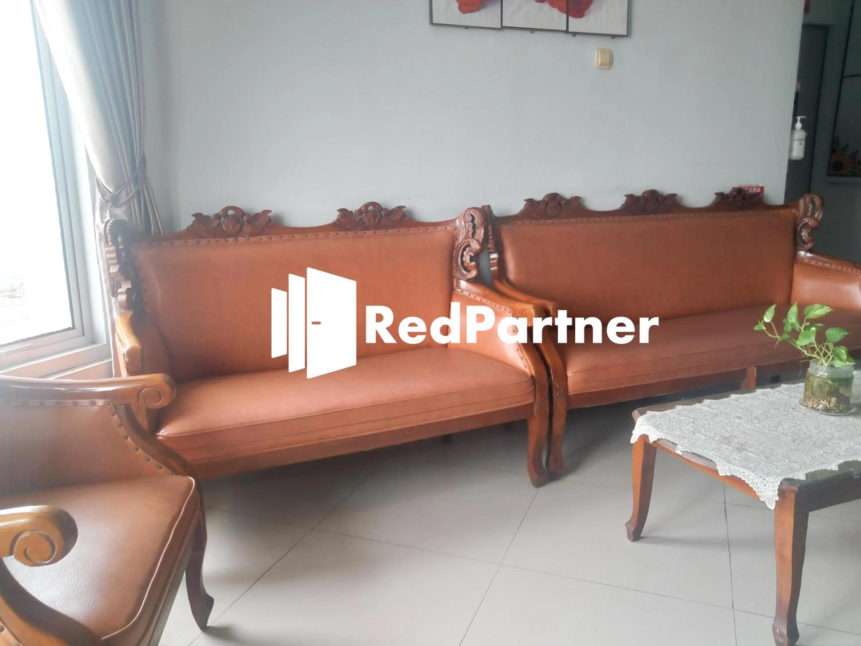 Seating area in Riyani Residence At Jalan Ahmad Yani Pemalang Mitra RedDoorz