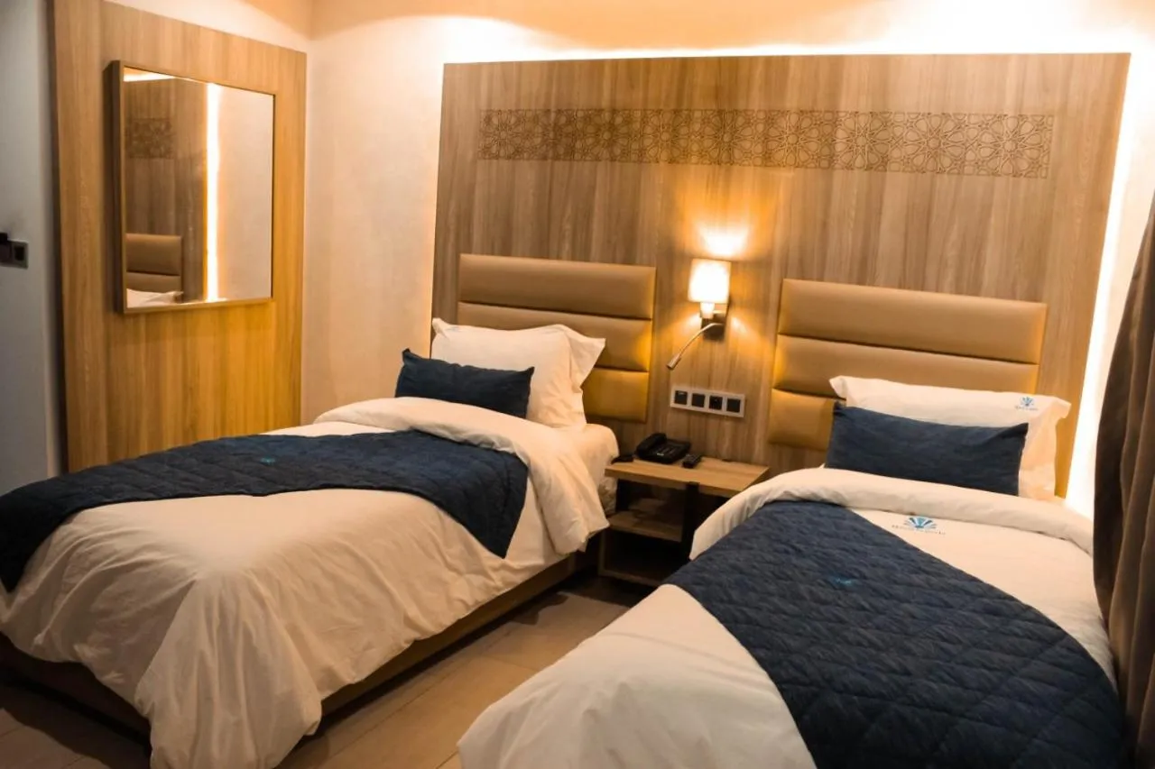 Bed in Hôtel La Perla