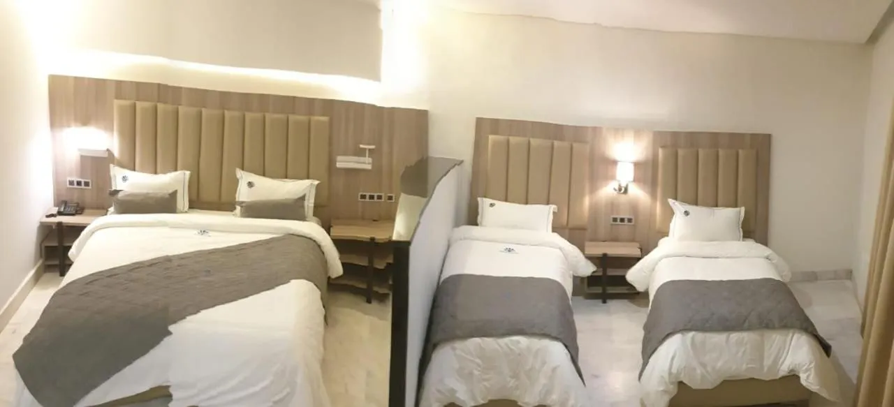 Bed in Hôtel La Perla