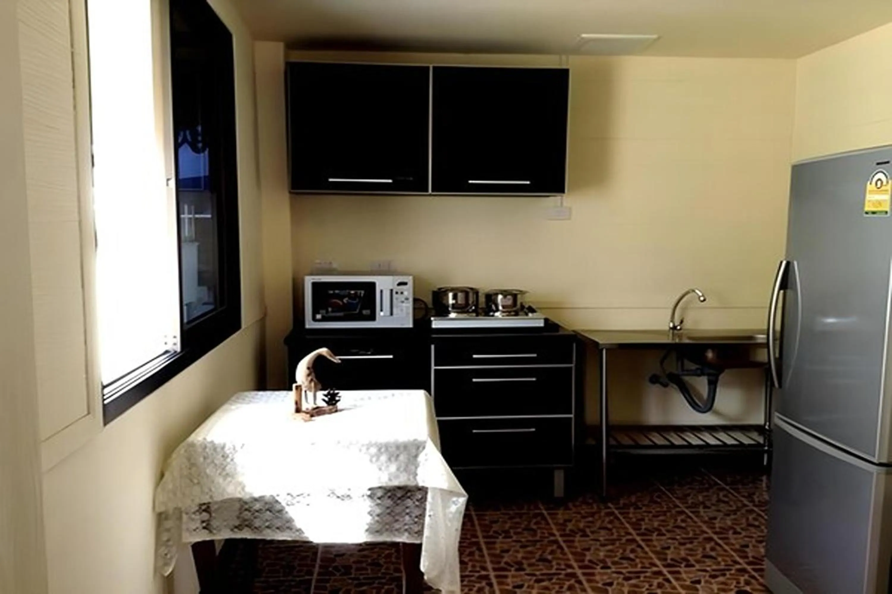 Kitchen or kitchenette in Sonya Residence