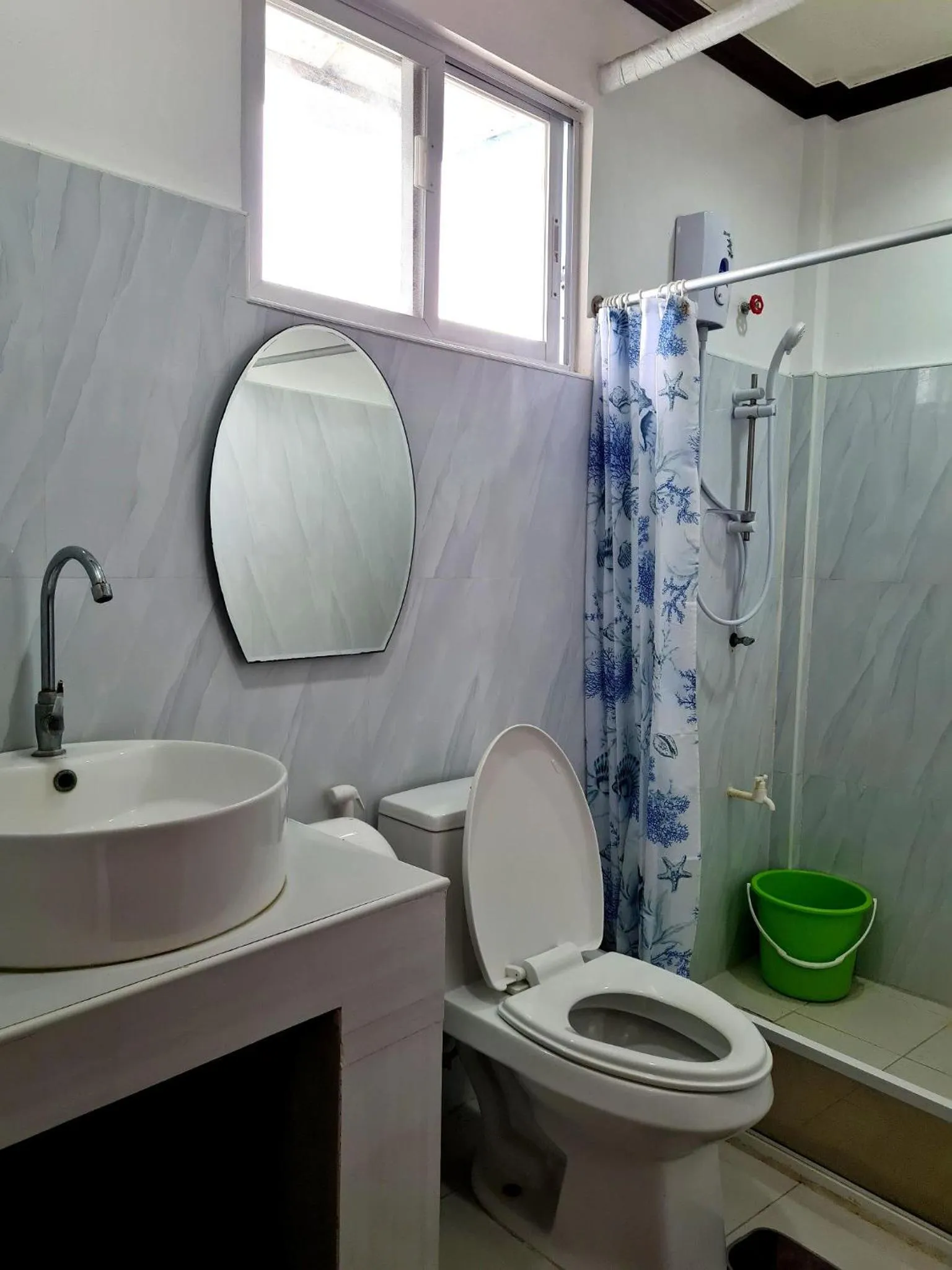 Bathroom in Alona Rose Hotel by SMS Hospitality
