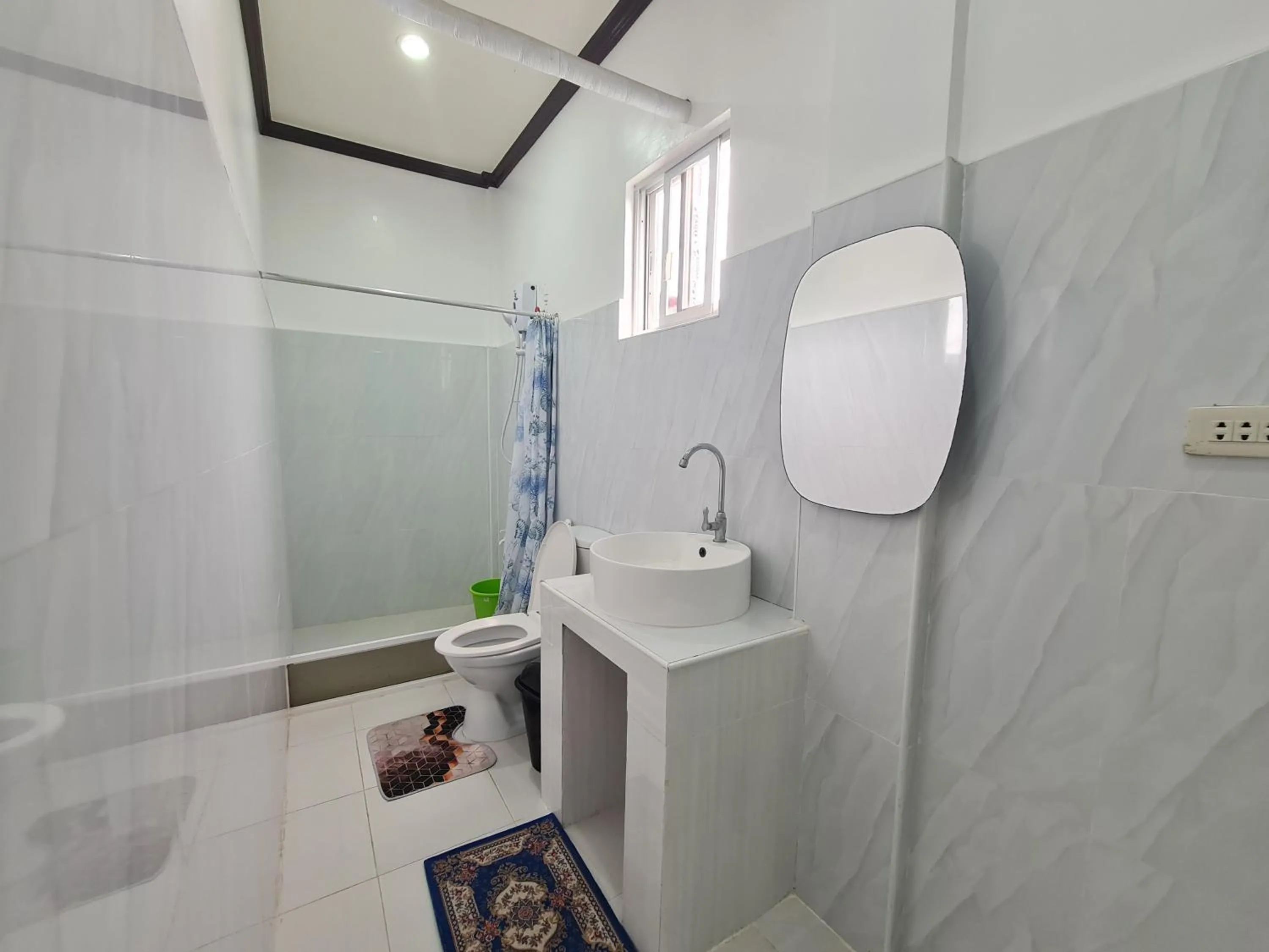 Bathroom in Alona Rose Hotel by SMS Hospitality