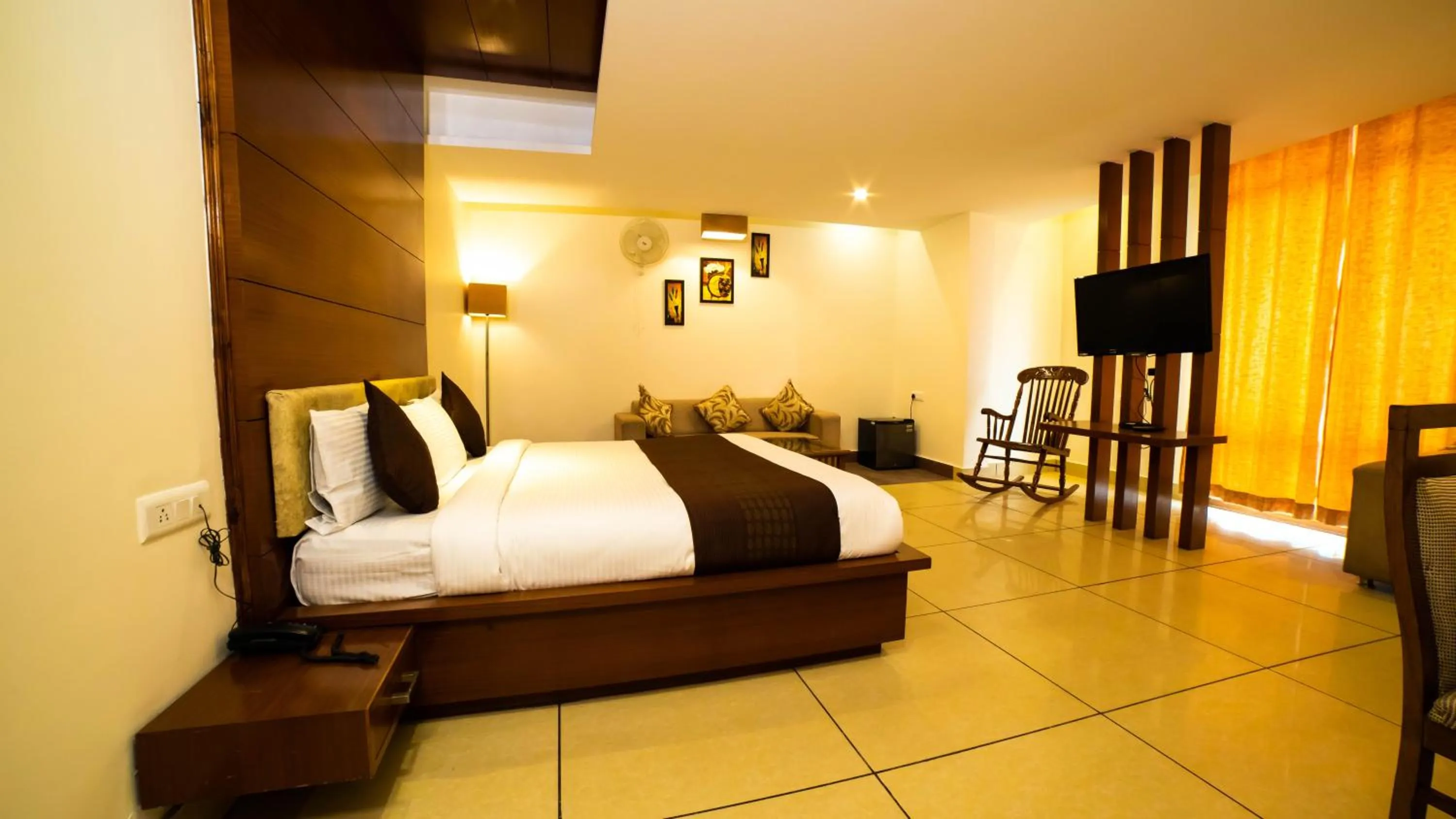 Bed in Vaayu Resorts And Spa