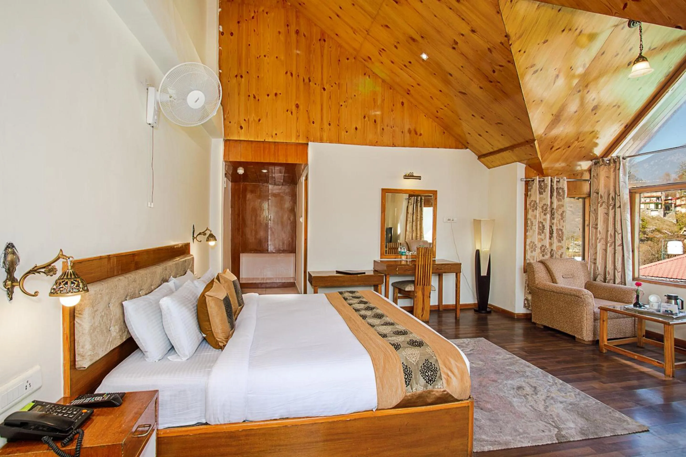 Bed in Vaayu Resorts And Spa