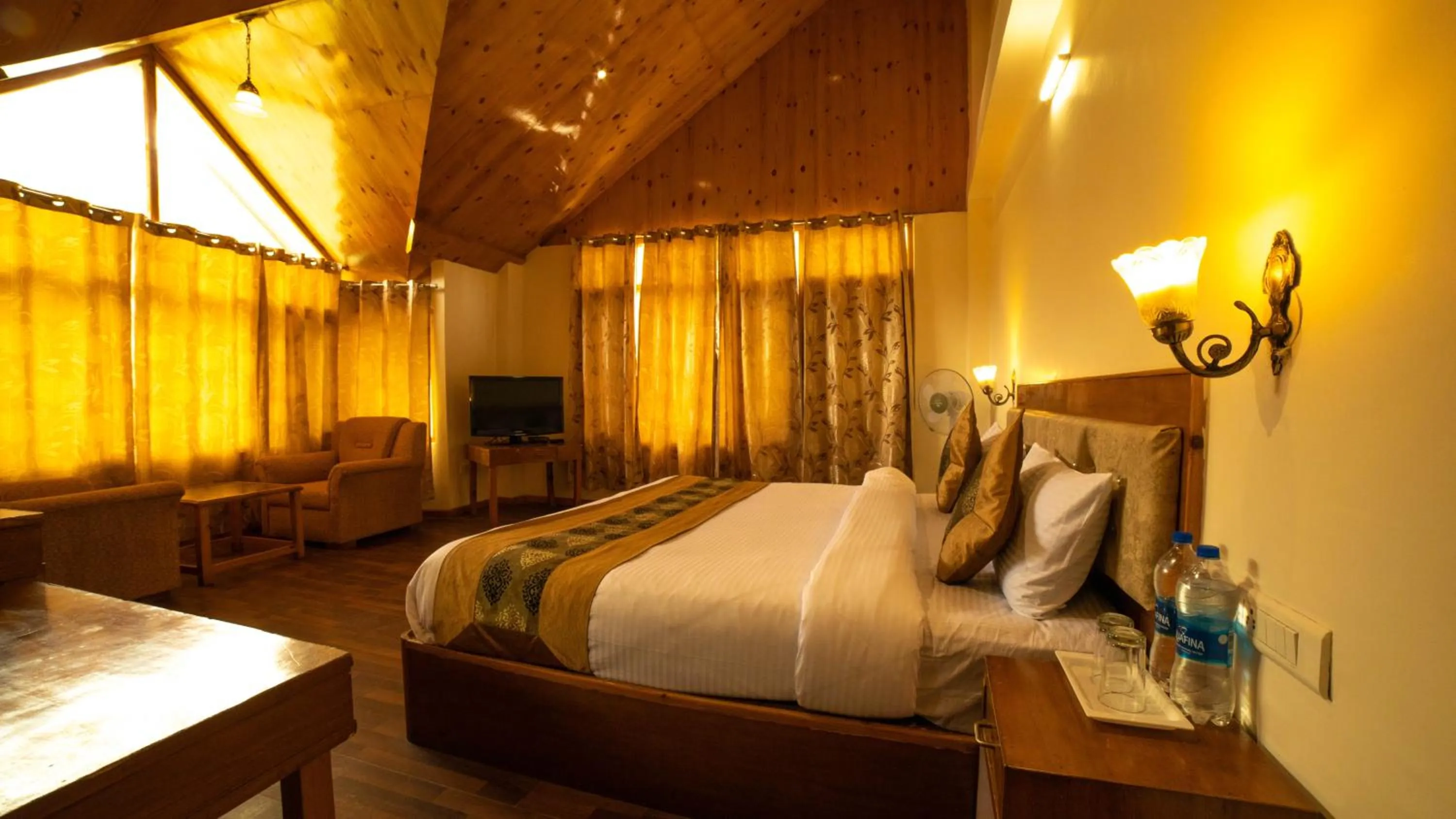 Bed in Vaayu Resorts And Spa