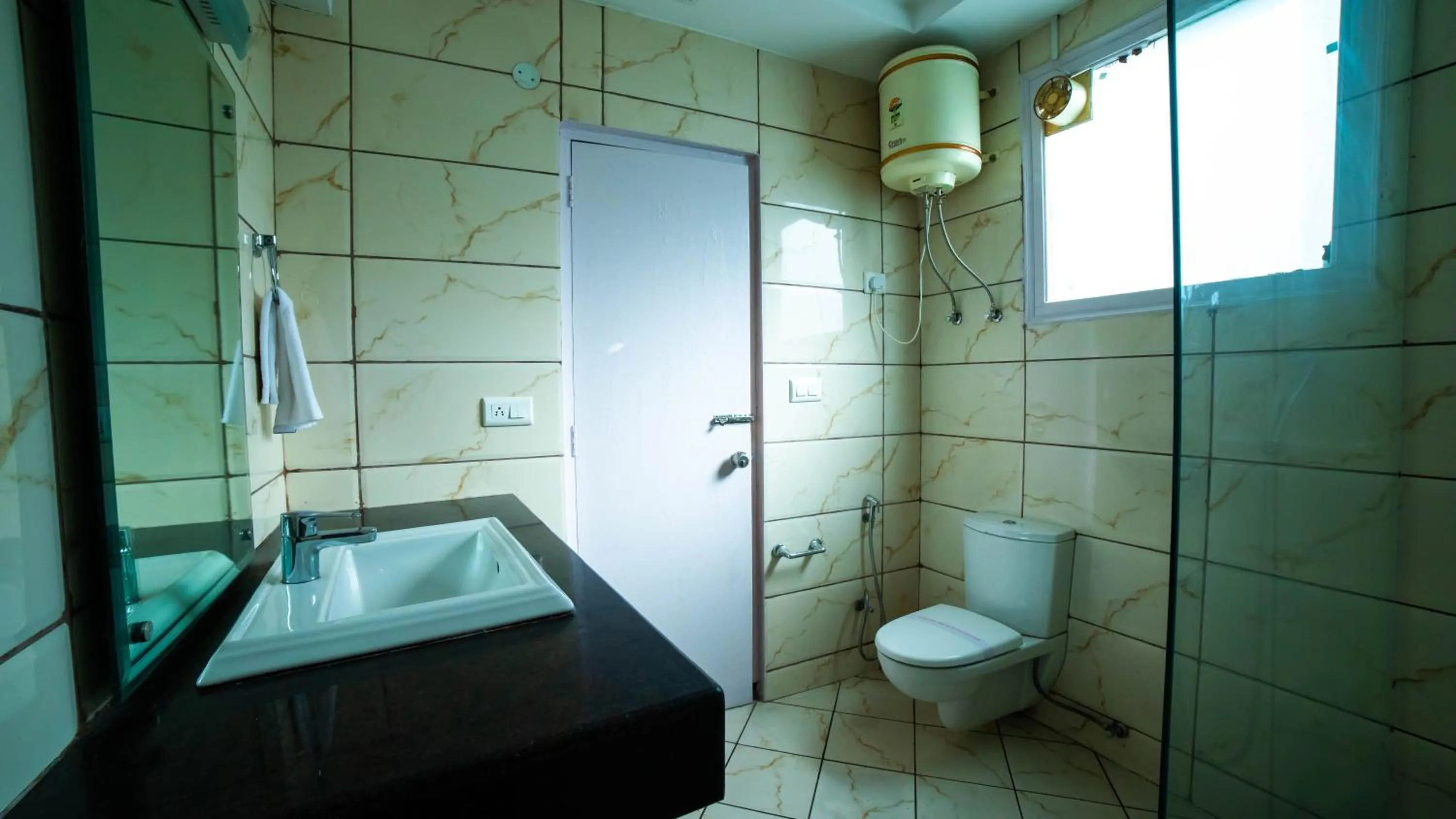 Shower in Vaayu Resorts And Spa