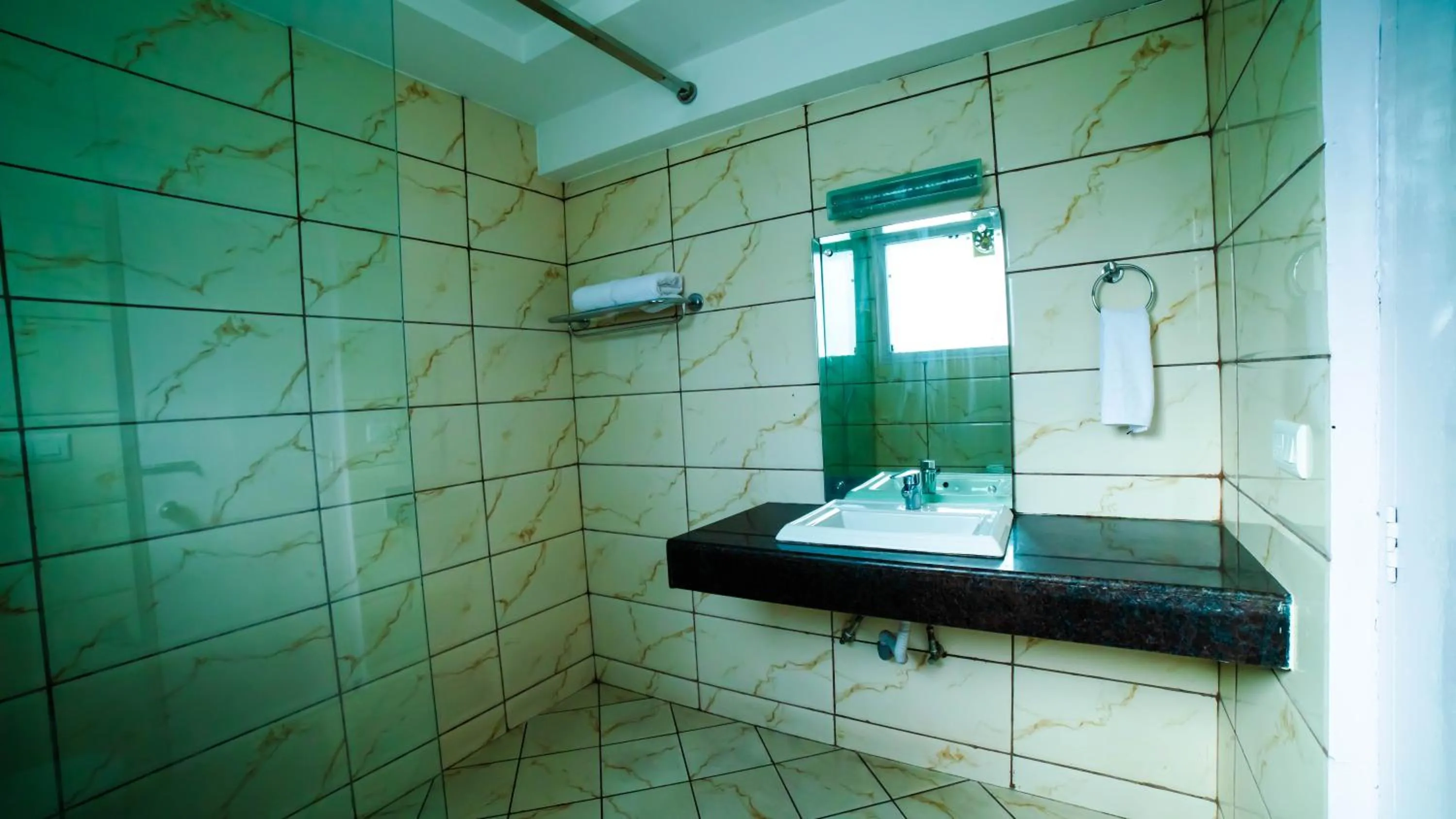 Shower in Vaayu Resorts And Spa