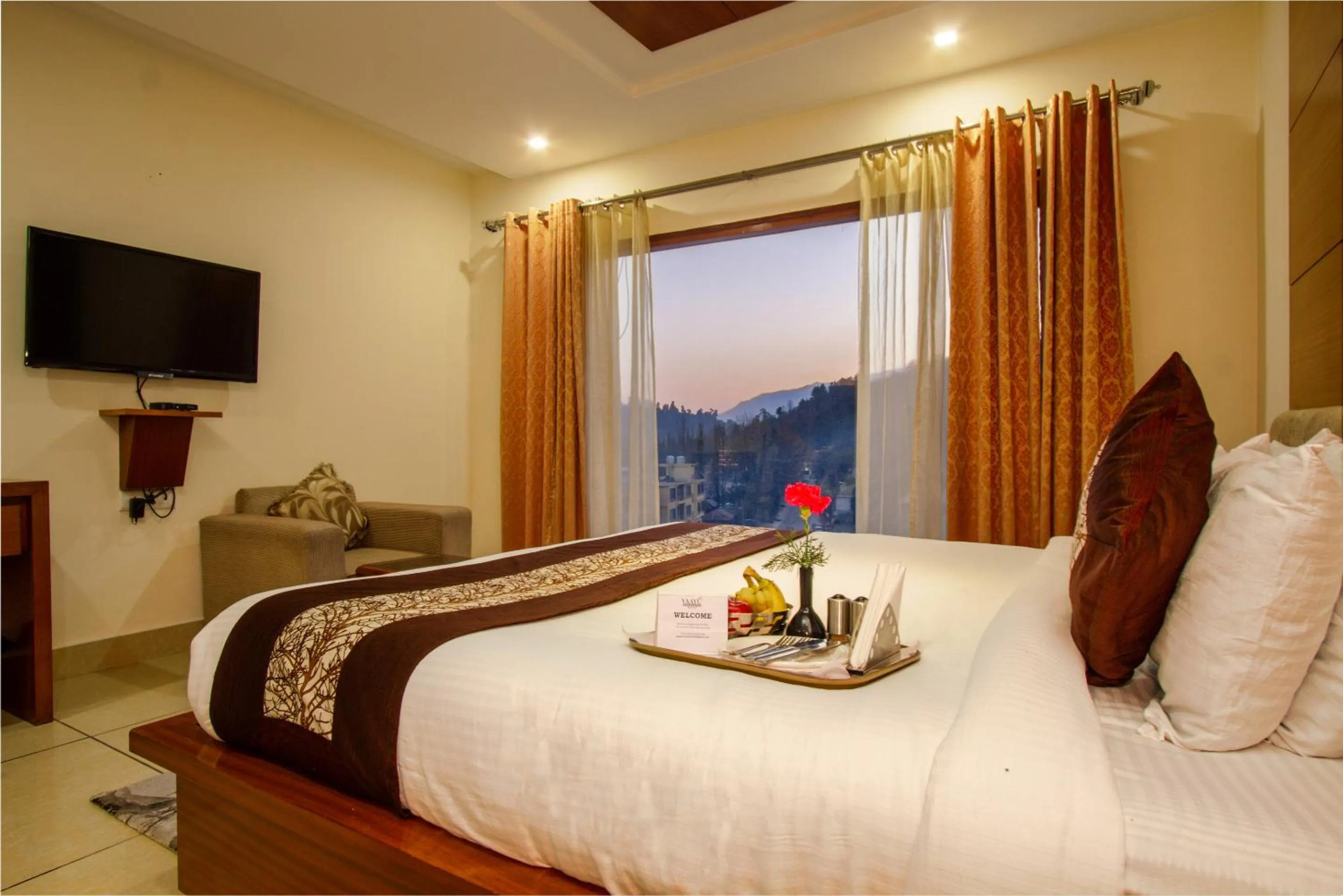 Bed in Vaayu Resorts And Spa