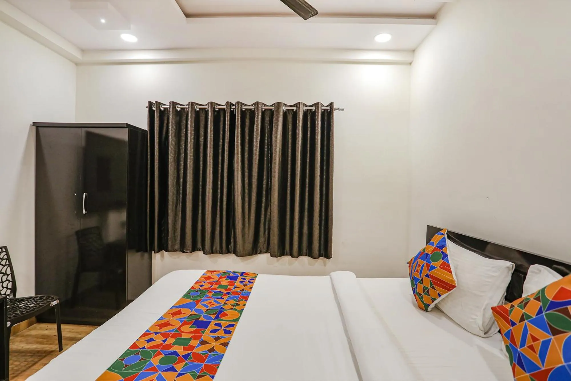 Bed in FabHotel Royal Stay - Beltarodi